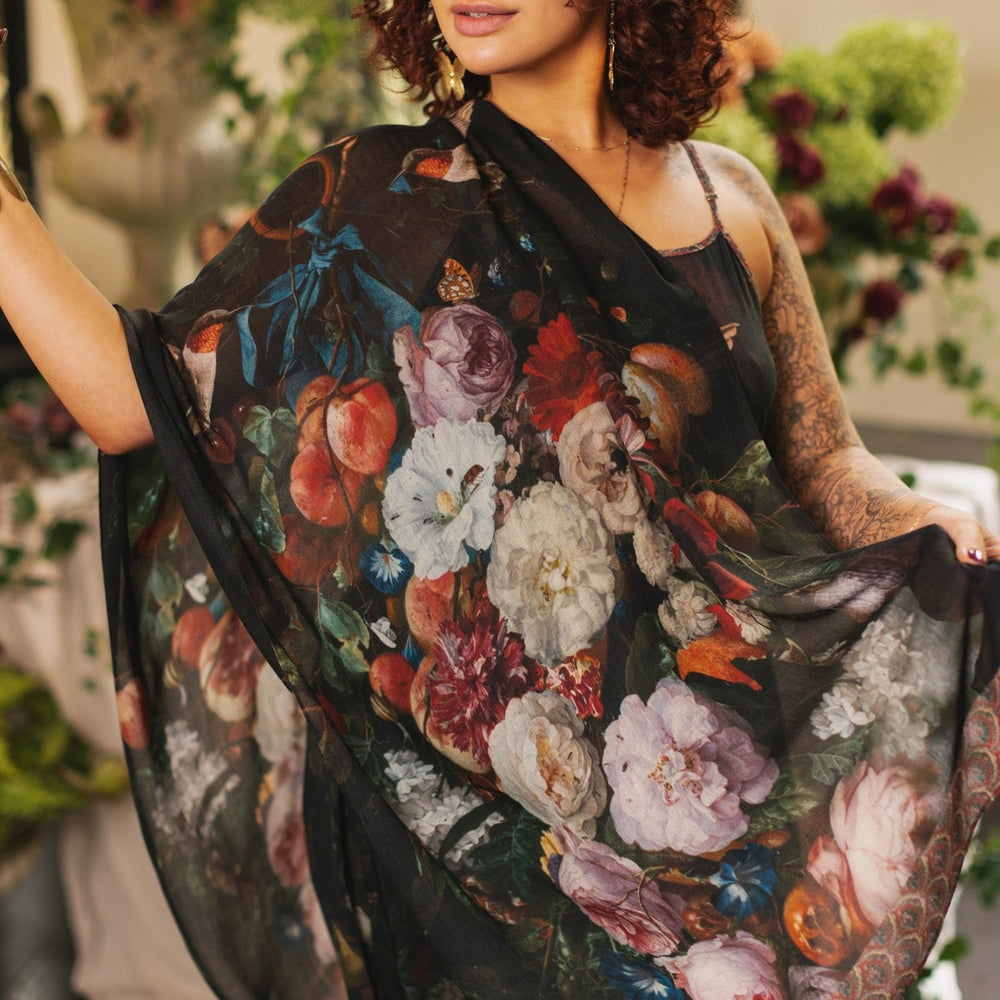 
                  
                    Hummingbirds and vintage floral artwork come to life on the Flight of Fancy Scarf – a lightweight, everyday scarf inspired by the paintings of Rachel Ruysch – Market of Stars.
                  
                