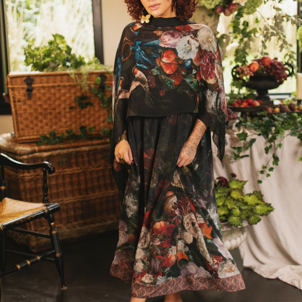 
                  
                    Hummingbirds and vintage floral artwork come to life on the Flight of Fancy Scarf – a lightweight, everyday scarf inspired by the paintings of Rachel Ruysch – Market of Stars.
                  
                
