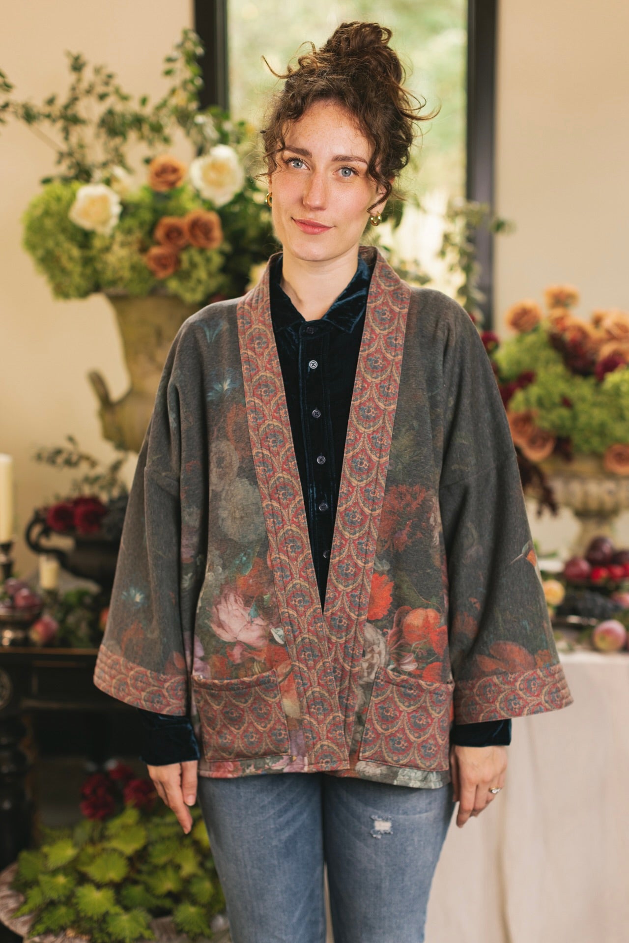 Model wearing a cozy cardigan lined with fleece showcasing hummingbirds and 1700s floral paintings - Market of Stars