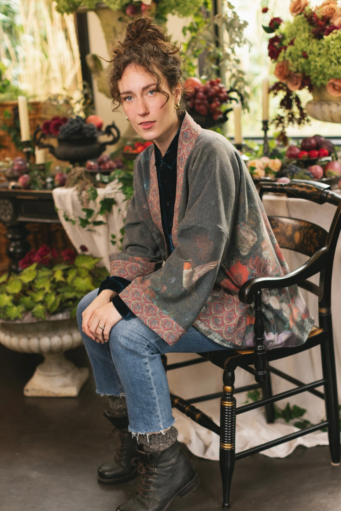 Model wearing a cozy cardigan lined with fleece showcasing hummingbirds and 1700s floral paintings - Market of Stars