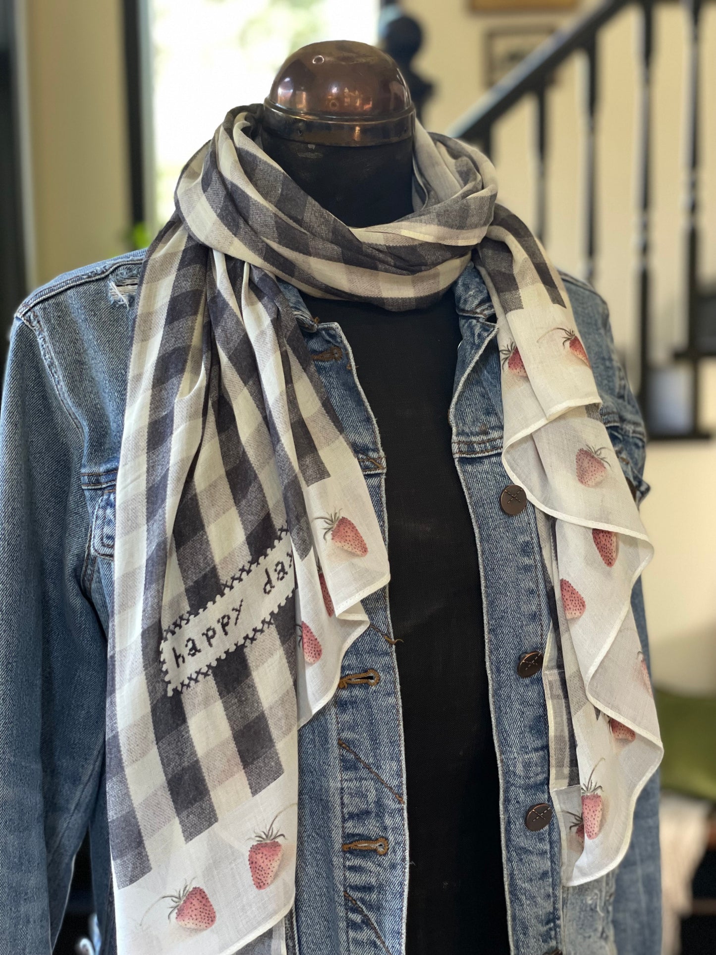 Model wearing Happy Days scarf featuring heritage gingham, vintage strawberries, and a cross-stitch patch inspired by an 1836 sampler – Market of Stars.