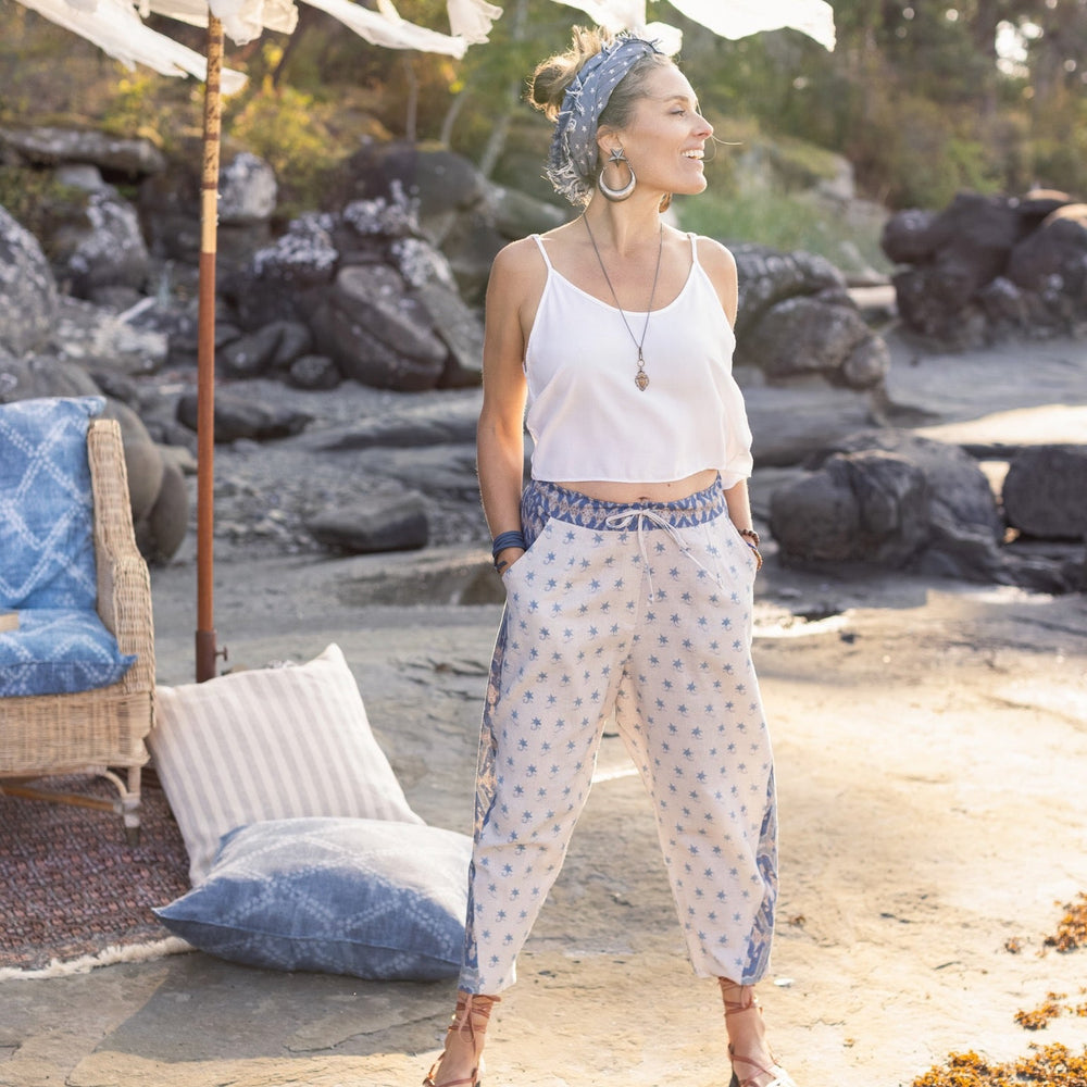 
                  
                    Model wearing Head in the Clouds Artist Pants featuring starry front panel and Turkish rug trim from Liotard’s portrait The Painter’s Wife-Market of Stars
                  
                