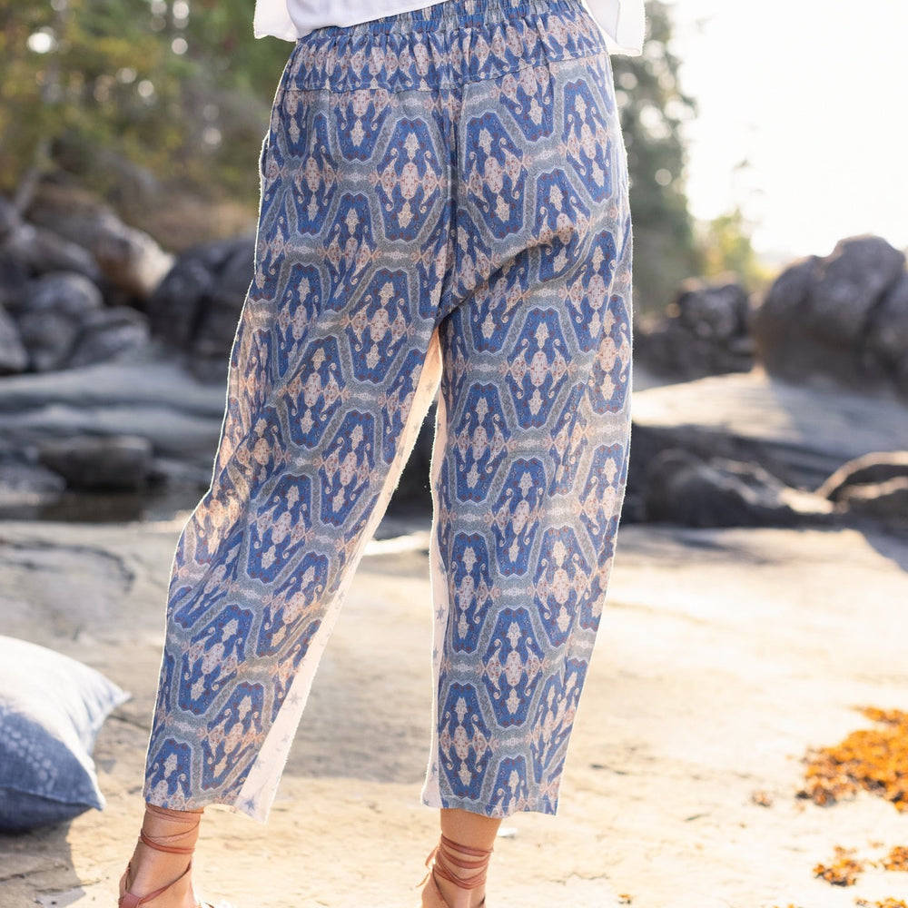 
                  
                    Model wearing Head in the Clouds Artist Pants featuring starry front panel and Turkish rug trim from Liotard’s portrait The Painter’s Wife-Market of Stars
                  
                