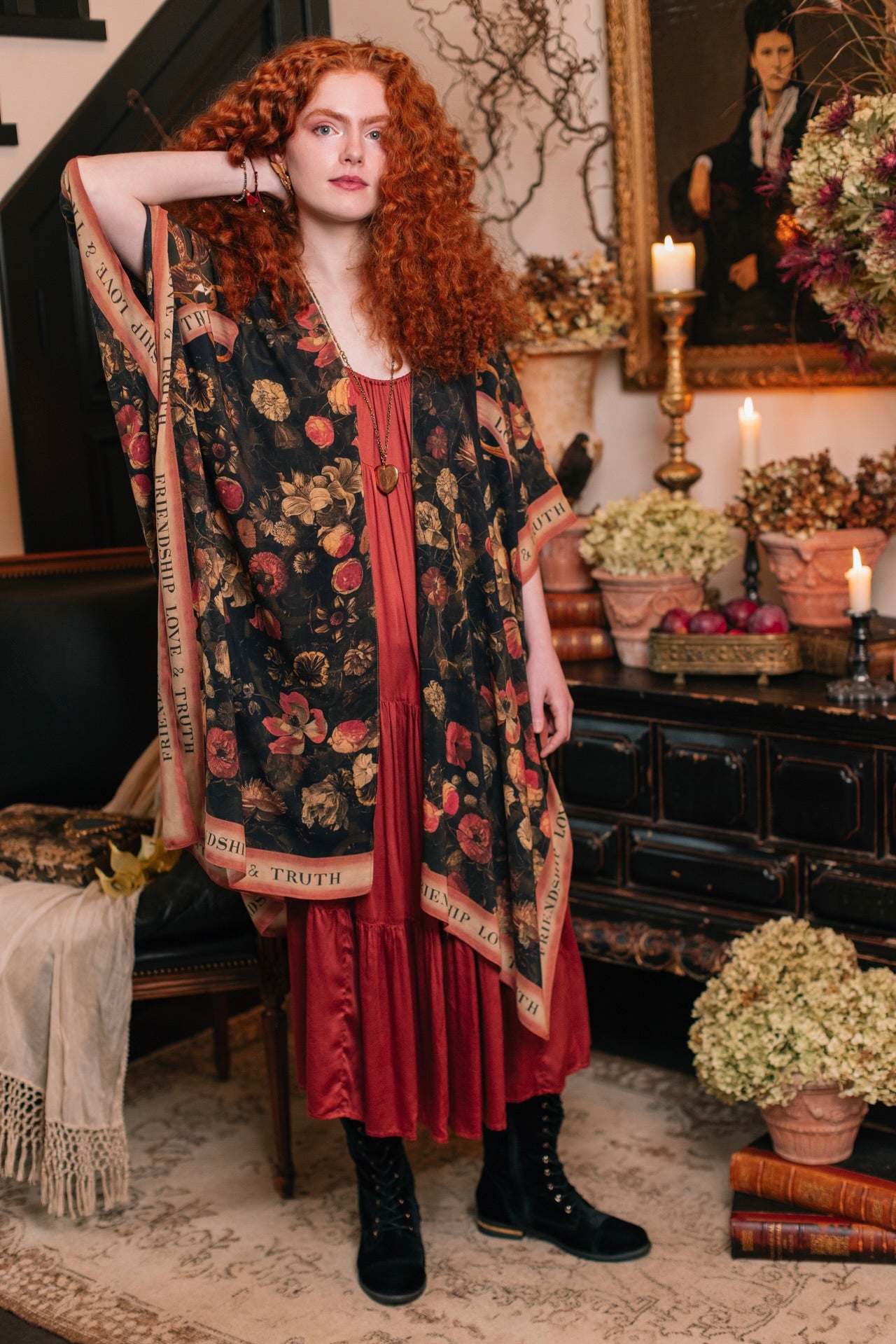 Model wearing a flowy bamboo-viscose duster featuring a collage of antique artwork with romance, loyalty, and old-world beauty - Market of Stars