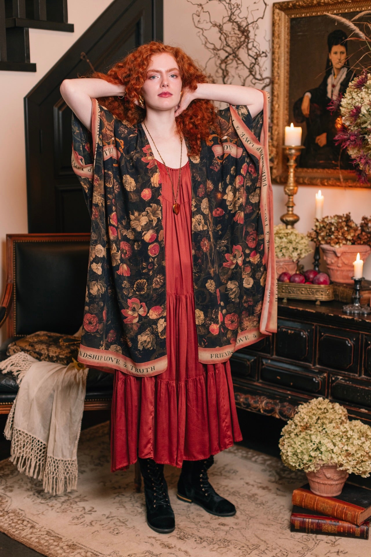 Model wearing a flowy bamboo-viscose duster featuring a collage of antique artwork with romance, loyalty, and old-world beauty - Market of Stars