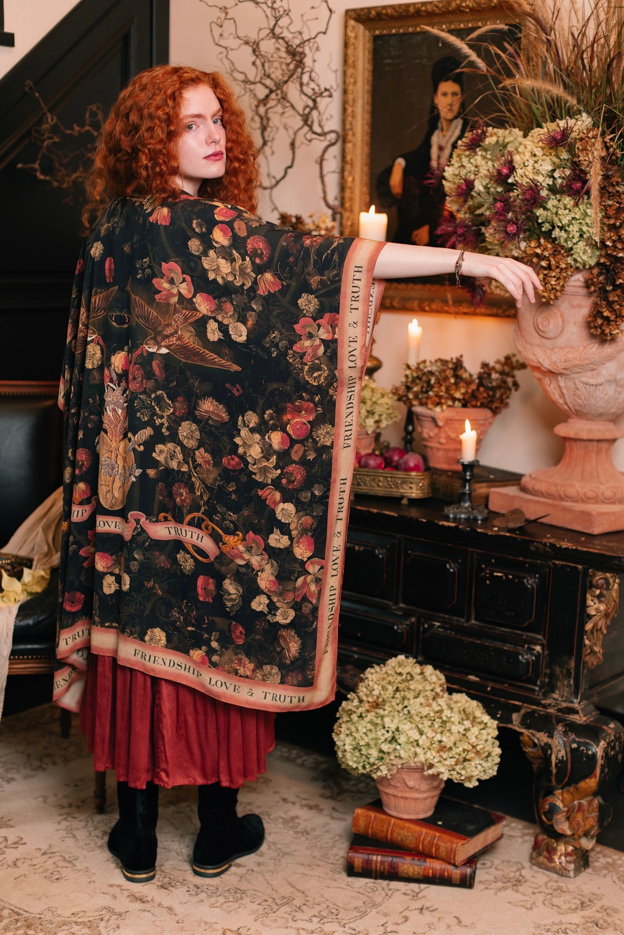 Model wearing a flowy bamboo-viscose duster featuring a collage of antique artwork with romance, loyalty, and old-world beauty - Market of Stars