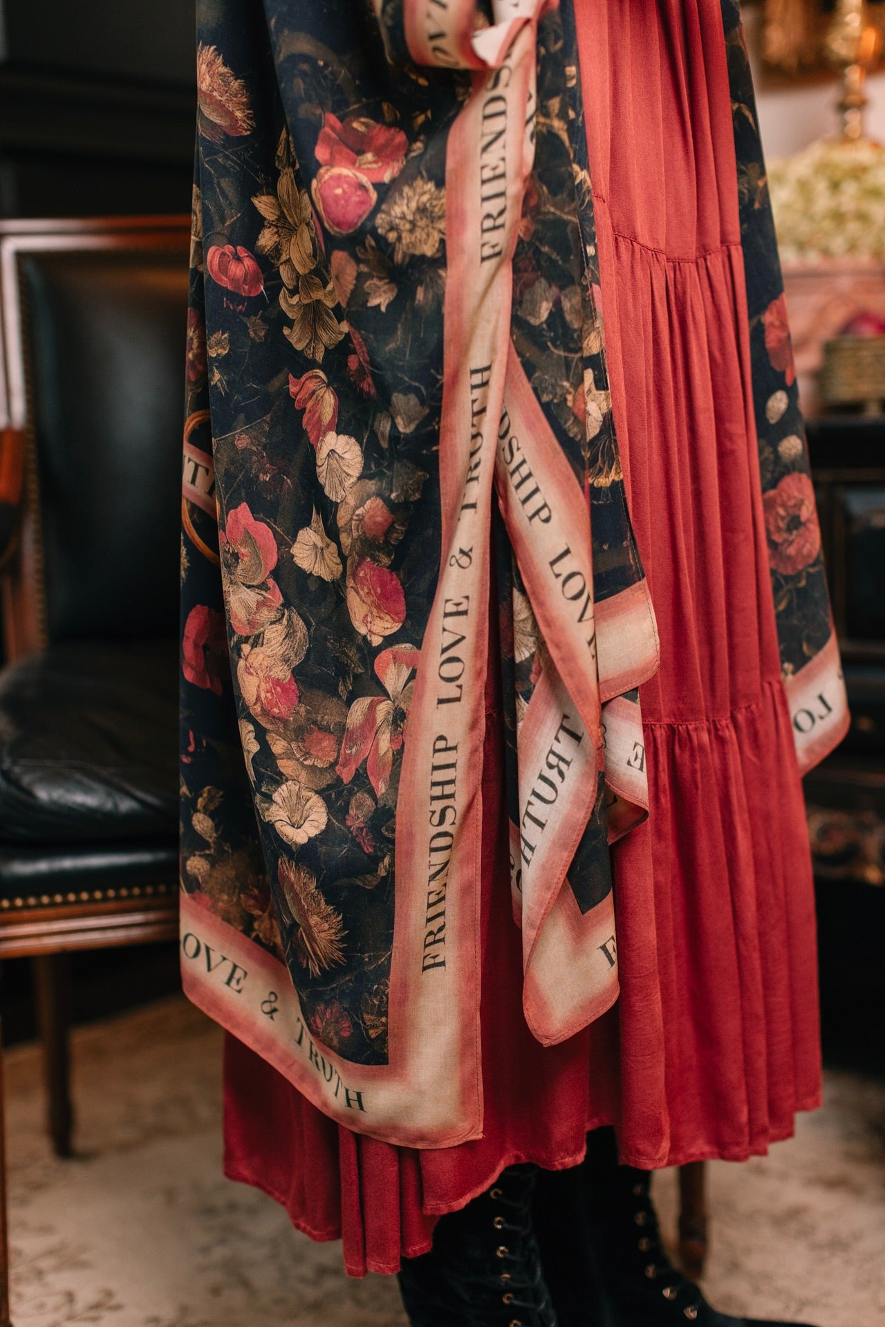 Model wearing a flowy bamboo-viscose duster featuring a collage of antique artwork with romance, loyalty, and old-world beauty - Market of Stars