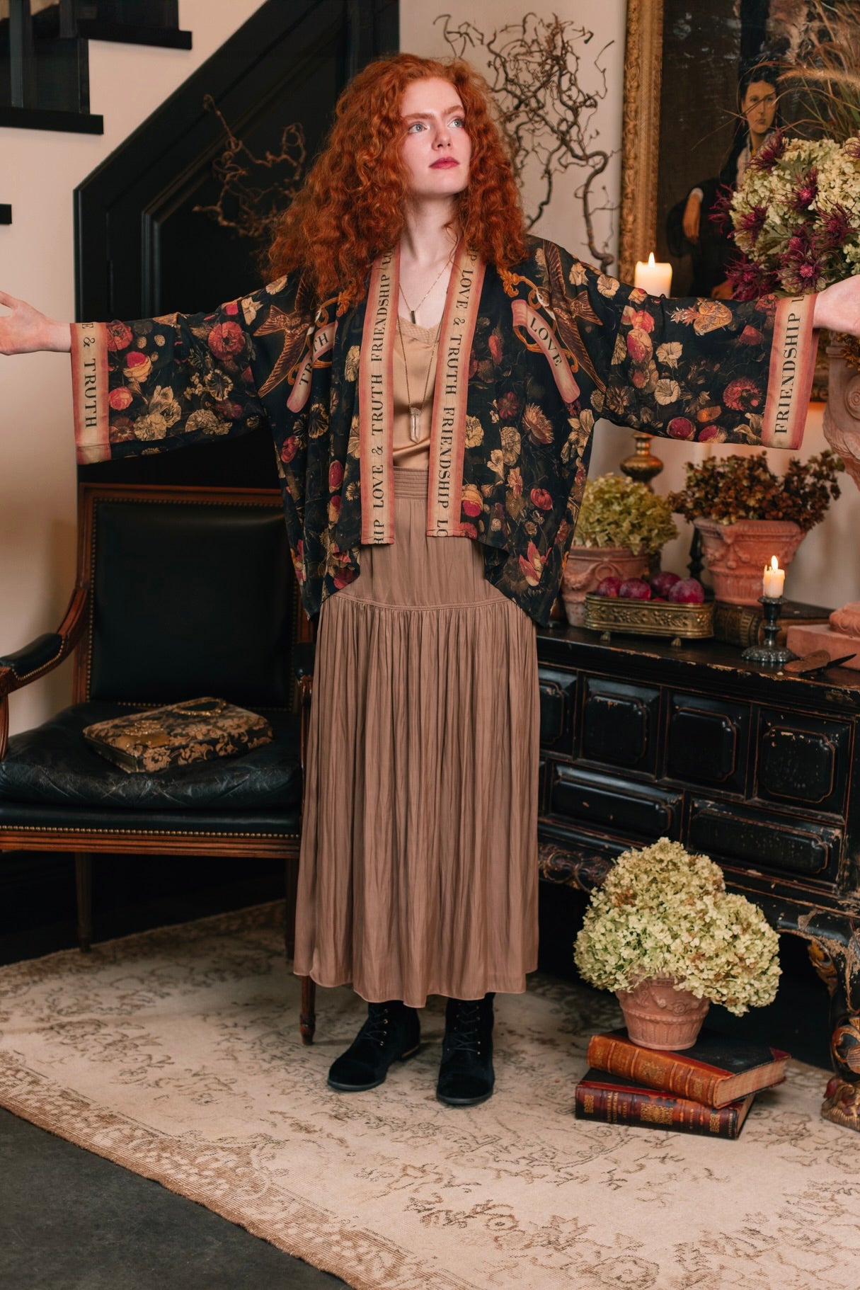 Model wearing a cropped-length bamboo-viscose duster featuring a collage of antique artwork with romance, loyalty, and old-world beauty - Market of Stars