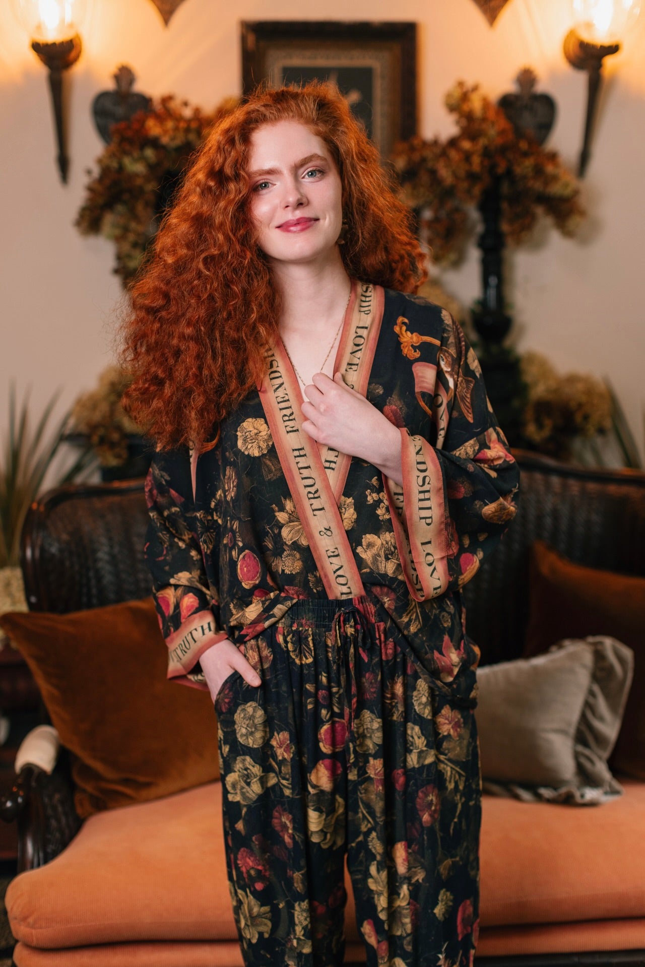 Model wearing a cropped-length bamboo-viscose duster featuring a collage of antique artwork with romance, loyalty, and old-world beauty - Market of Stars