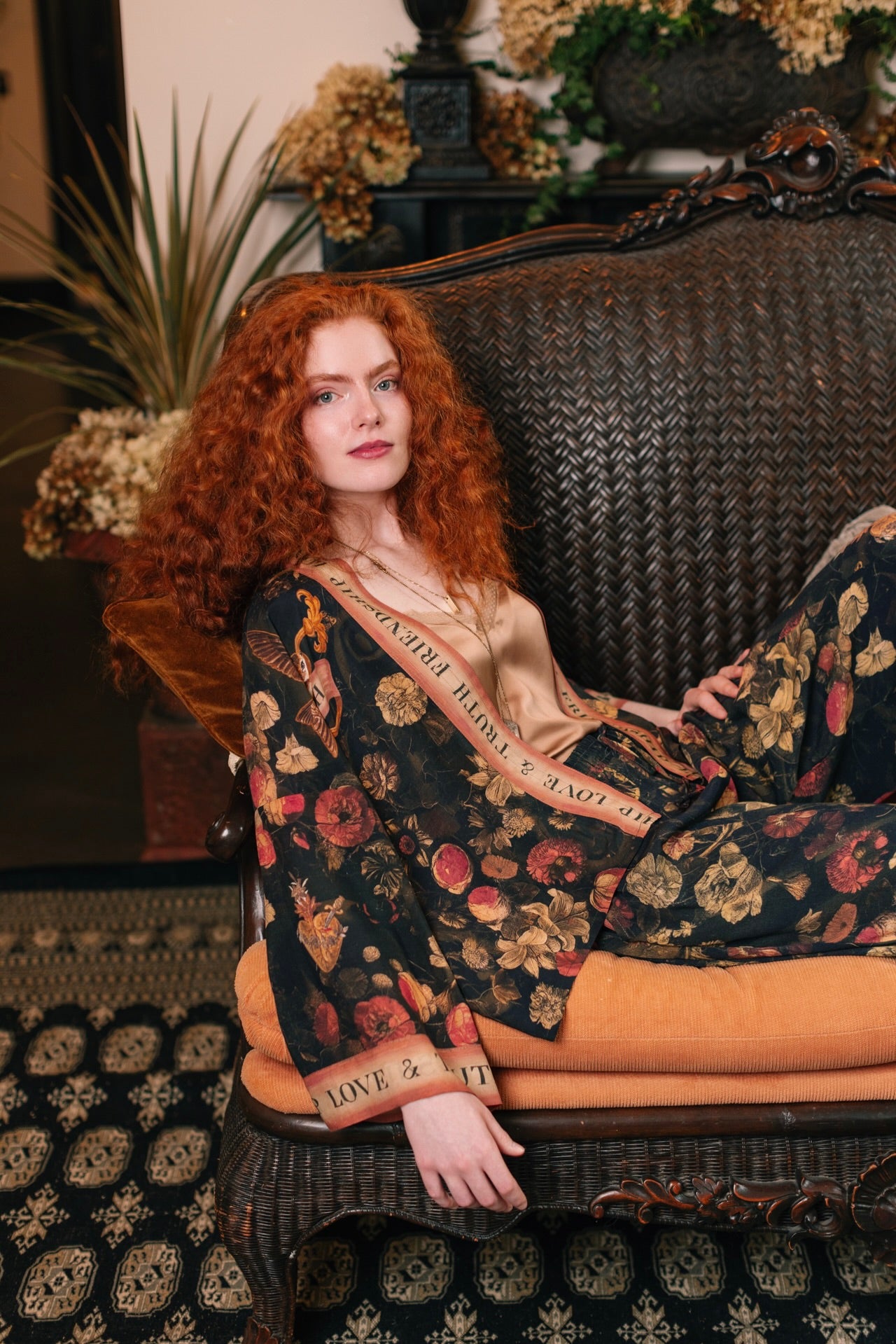 Model wearing a cropped-length bamboo-viscose duster featuring a collage of antique artwork with romance, loyalty, and old-world beauty - Market of Stars