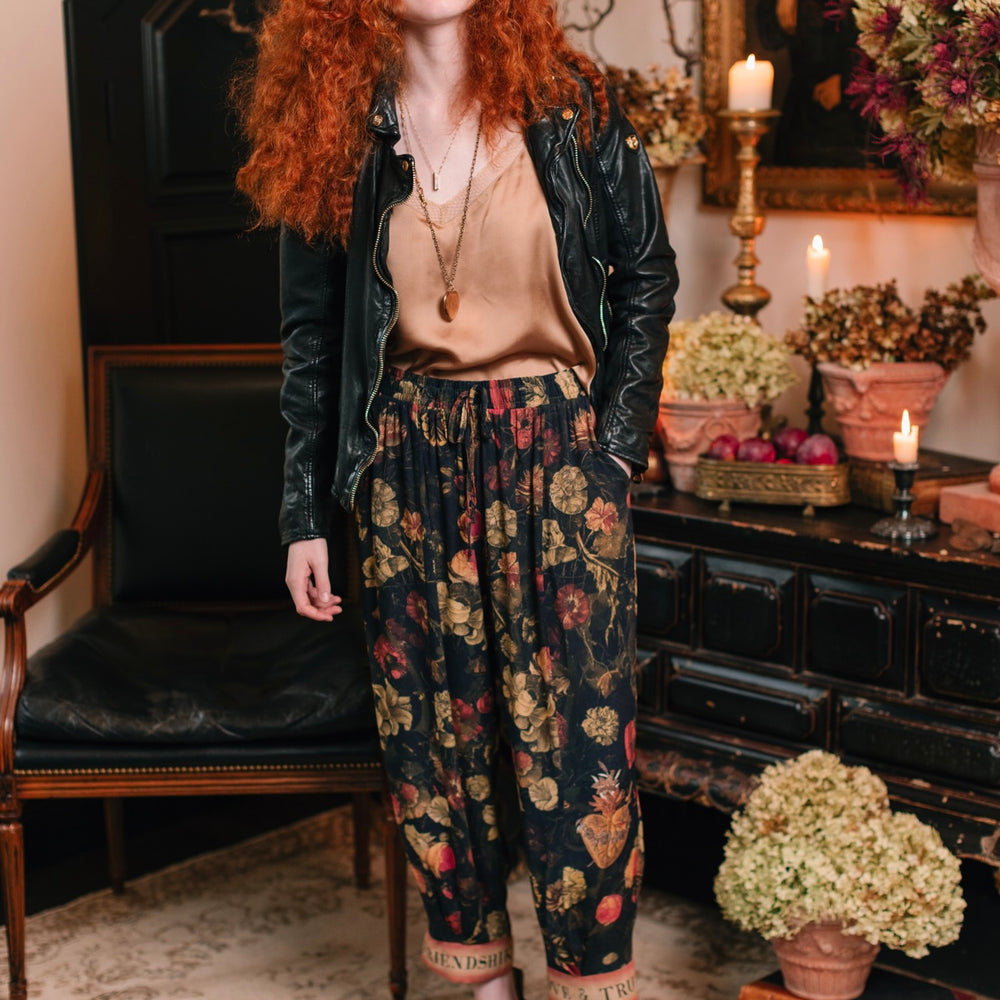 Model wearing a lightweight drapey viscose crepe pant that moves like poetry in motion. Relaxed, romantic and ready for adventure - Market of Stars