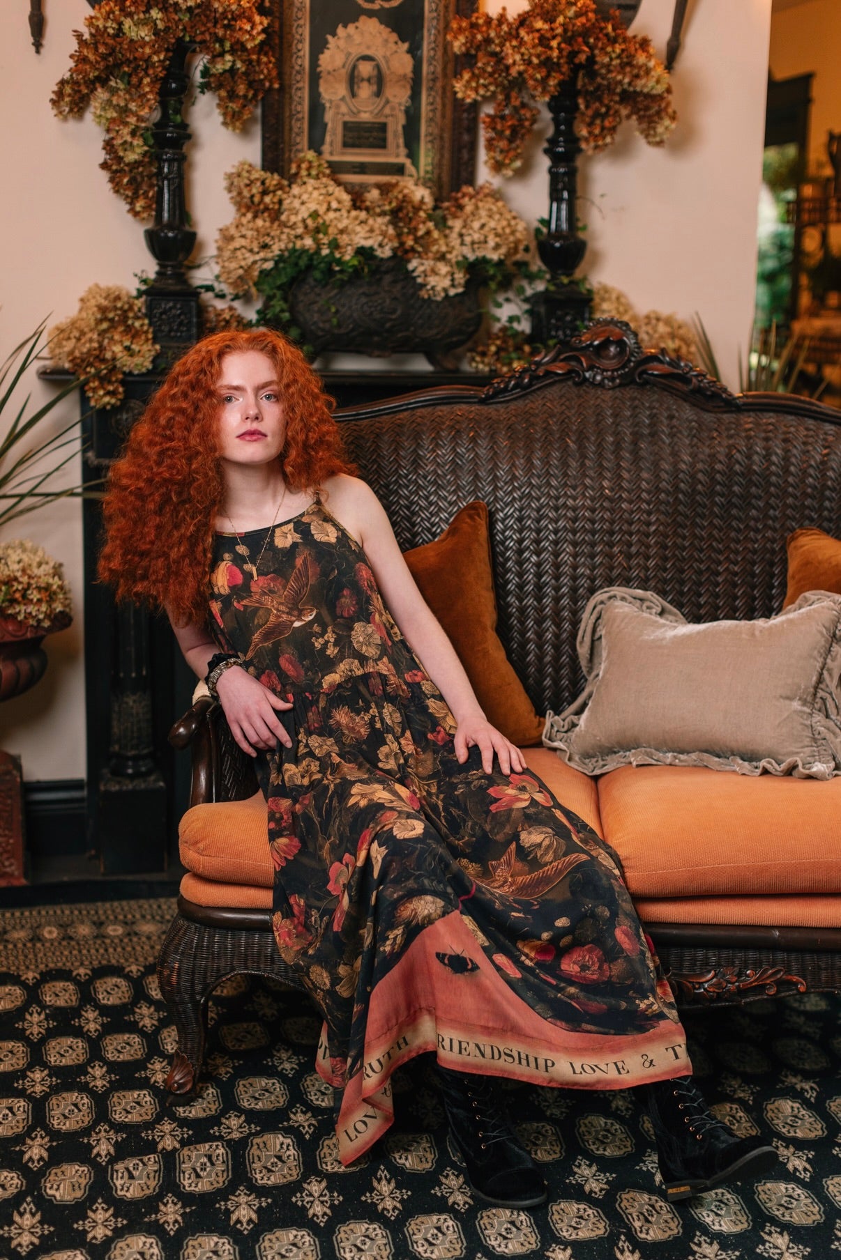 Model wearing a maxi-length bamboo-viscose slip dress featuring a collage of antique artwork with romance, loyalty, and old-world beauty - Market of Stars
