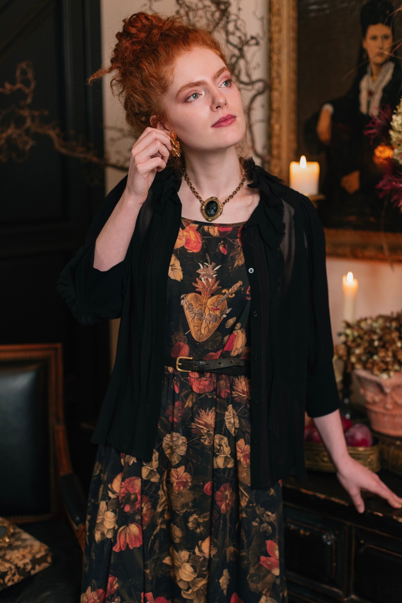 Model wearing a maxi-length bamboo-viscose slip dress featuring a collage of antique artwork with romance, loyalty, and old-world beauty - Market of Stars