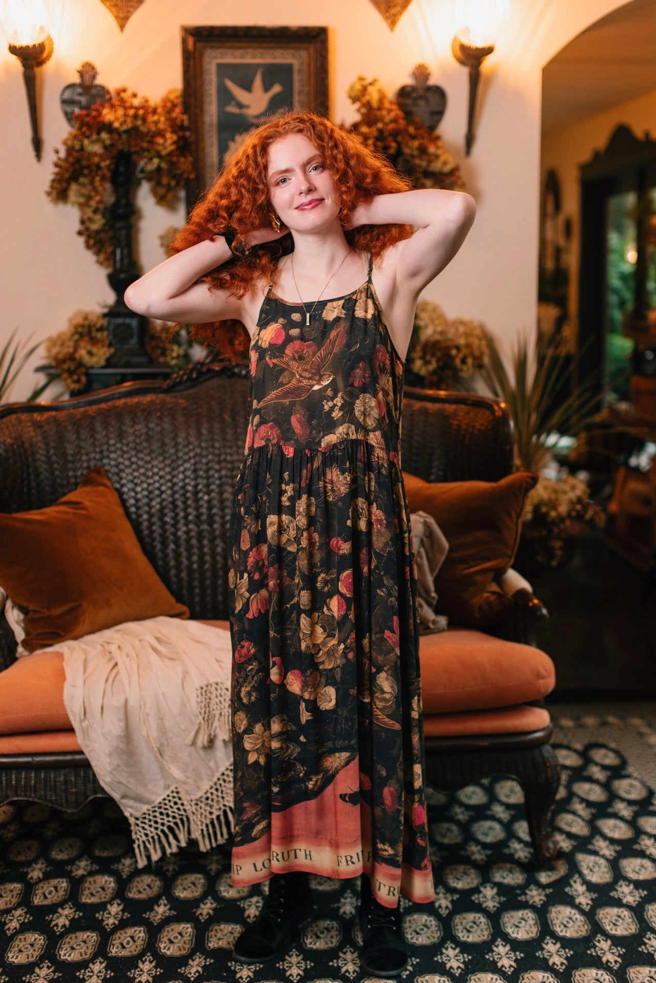 Model wearing a maxi-length bamboo-viscose slip dress featuring a collage of antique artwork with romance, loyalty, and old-world beauty - Market of Stars