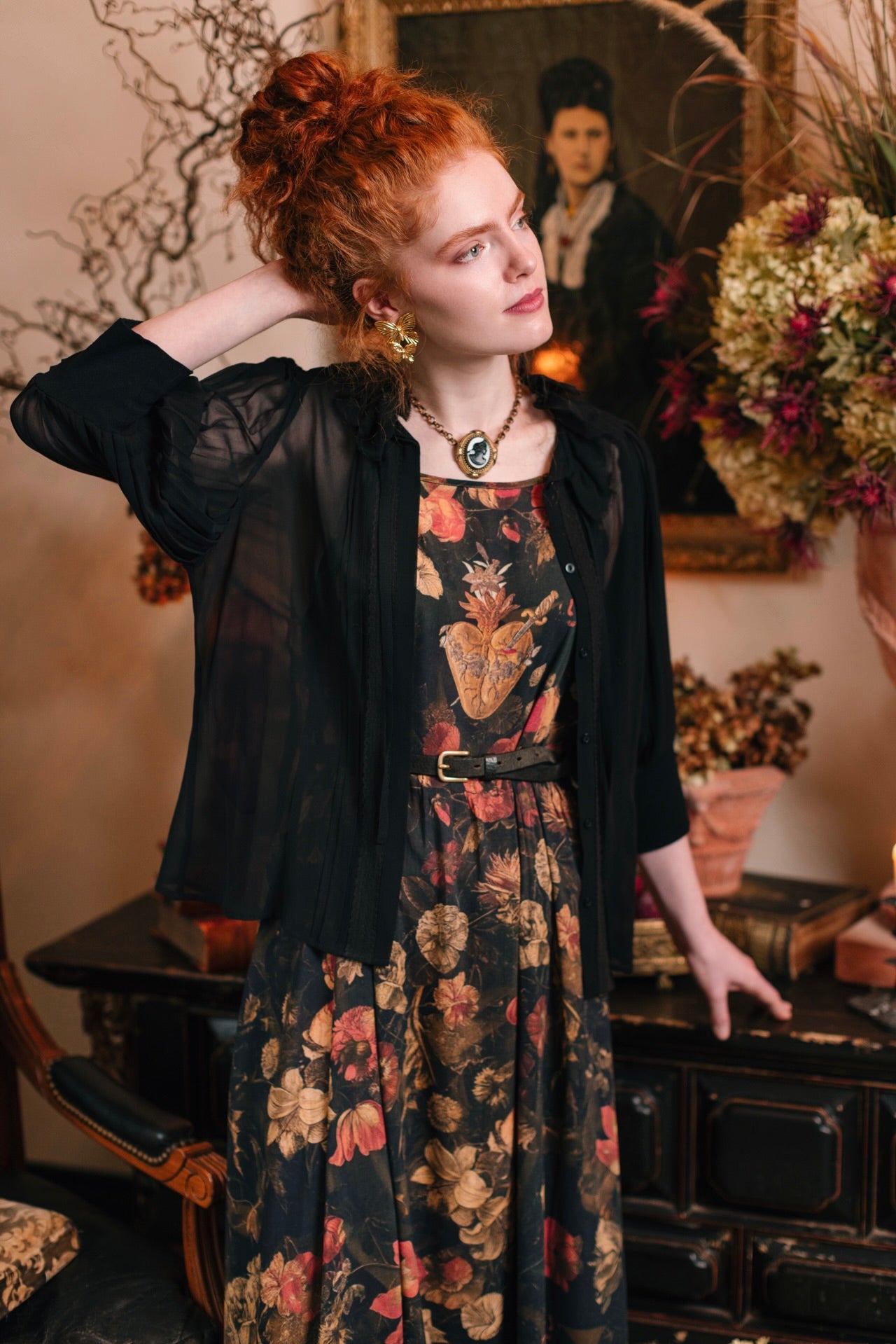 Model wearing a maxi-length bamboo-viscose slip dress featuring a collage of antique artwork with romance, loyalty, and old-world beauty - Market of Stars