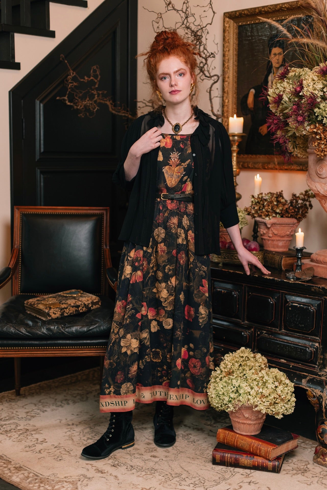 Model wearing a maxi-length bamboo-viscose slip dress featuring a collage of antique artwork with romance, loyalty, and old-world beauty - Market of Stars