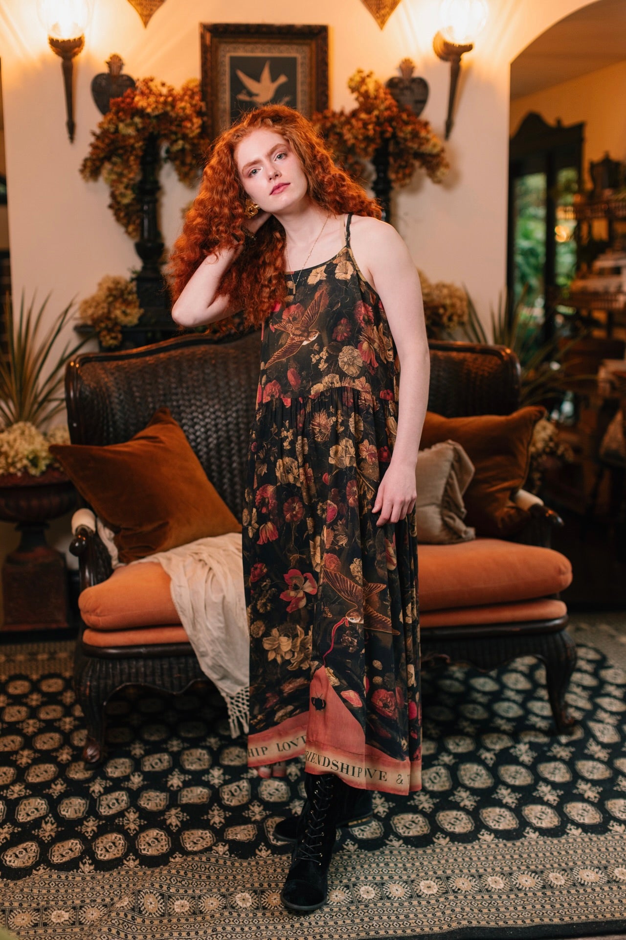 Model wearing a maxi-length bamboo-viscose slip dress featuring a collage of antique artwork with romance, loyalty, and old-world beauty - Market of Stars