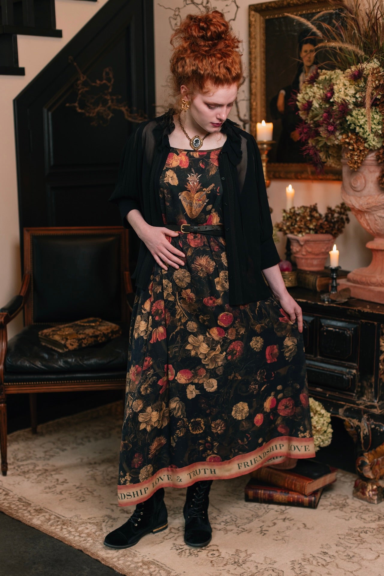 Model wearing a maxi-length bamboo-viscose slip dress featuring a collage of antique artwork with romance, loyalty, and old-world beauty - Market of Stars