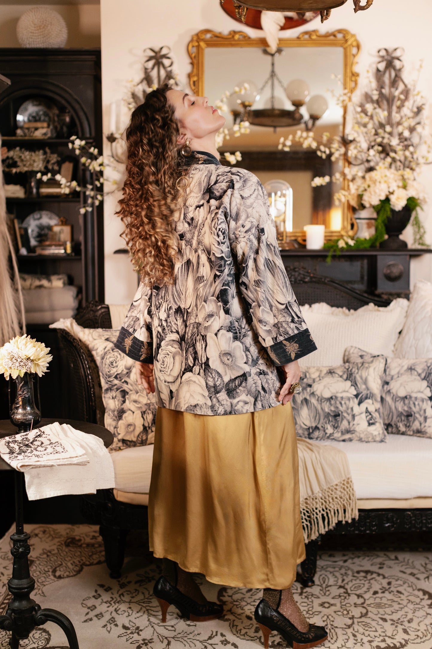 Model wearing a soft cotton velvet duster ft. 1900's floral lithographs. A garden dreamt up in ink - Market of Stars