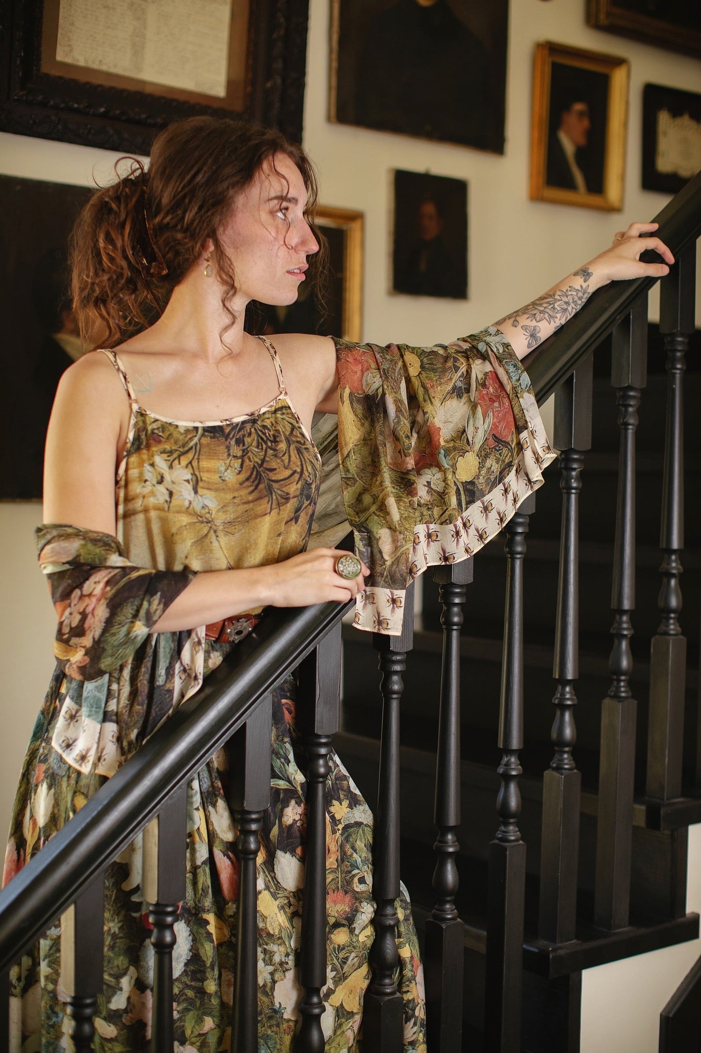 Model wearing the I Dream in Flowers Bohéme Slip Dress with vintage-inspired floral artwork and Victorian bumblebee details, perfect for layering or lounging – Market of Stars.