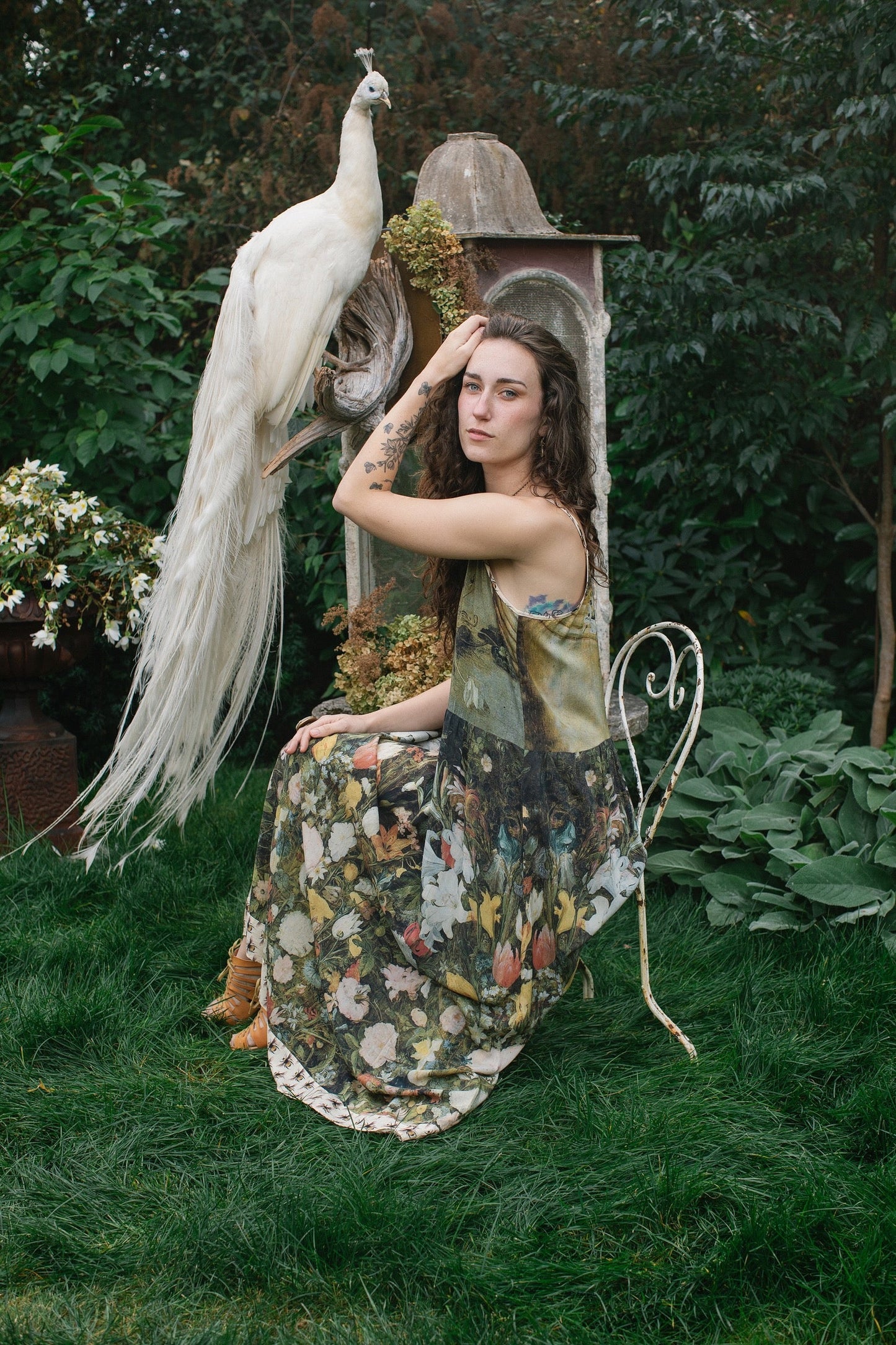 Model wearing the I Dream in Flowers Bohéme Slip Dress with vintage-inspired floral artwork and Victorian bumblebee details, perfect for layering or lounging – Market of Stars.
