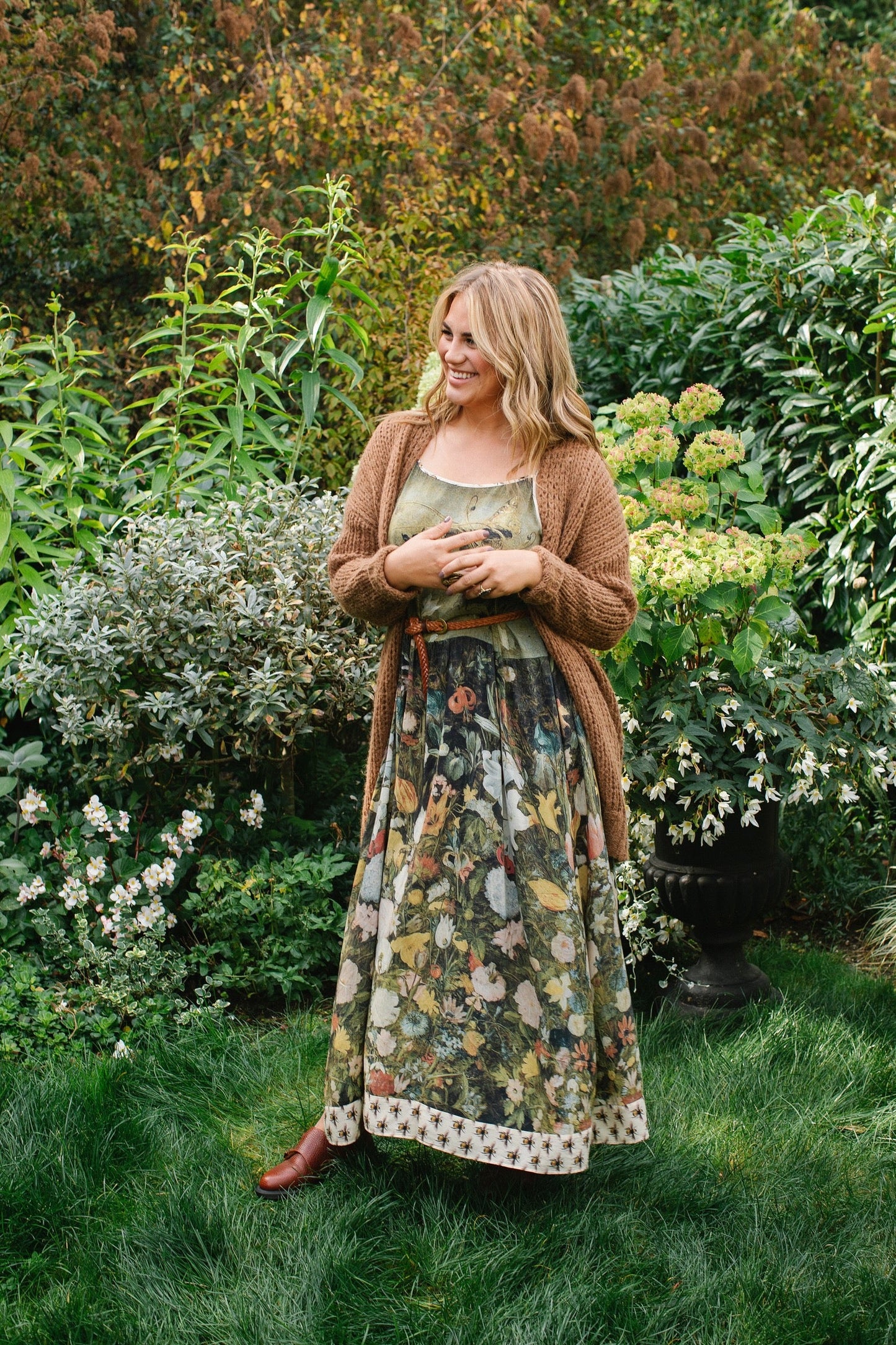 Model wearing the I Dream in Flowers Bohéme Slip Dress with vintage-inspired floral artwork and Victorian bumblebee details, perfect for layering or lounging – Market of Stars.
