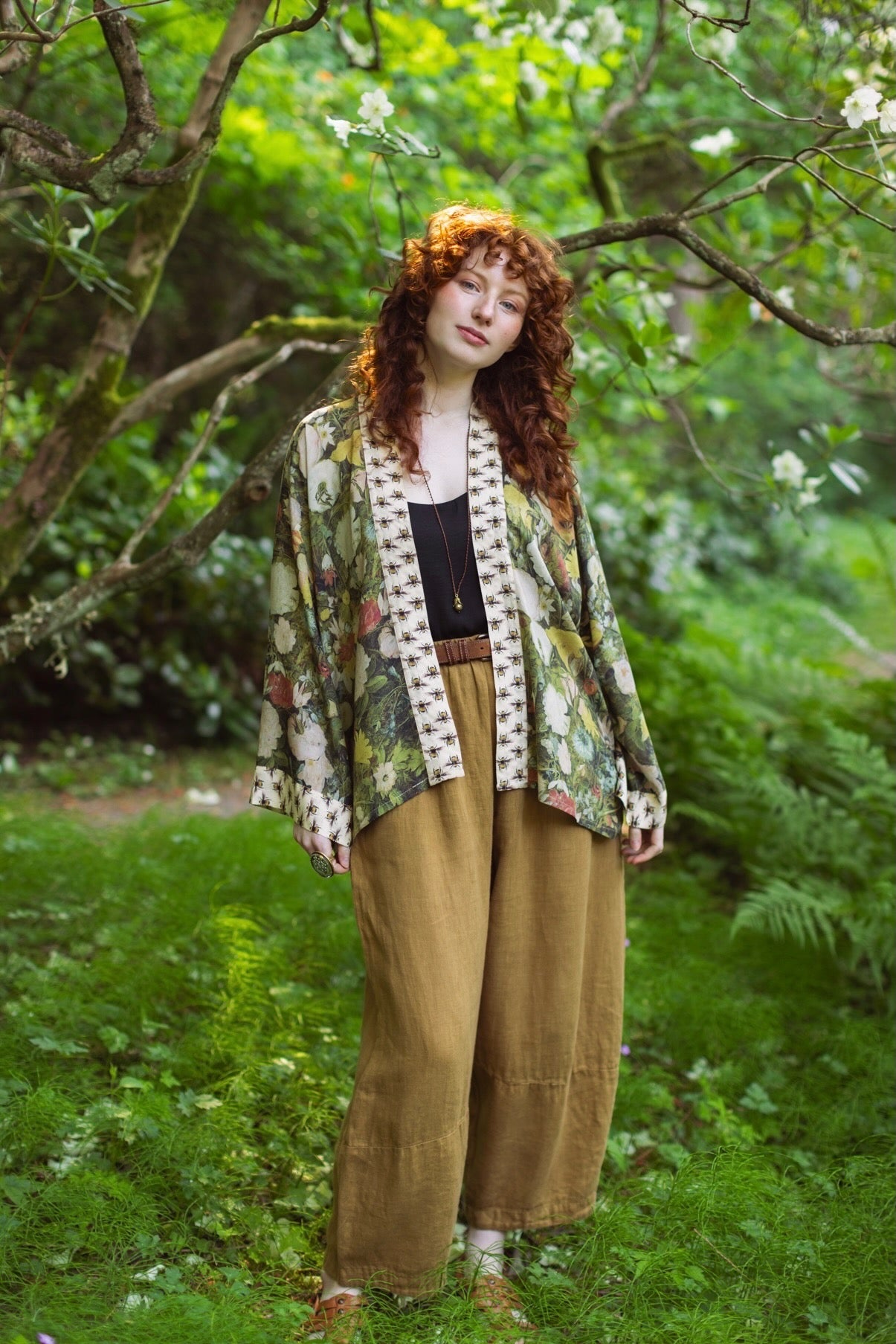 Model wearing the I Dream in Flowers cropped kimono featuring romantic floral artwork by Jan Brueghel and Victorian bumblebee trim – Market of Stars.