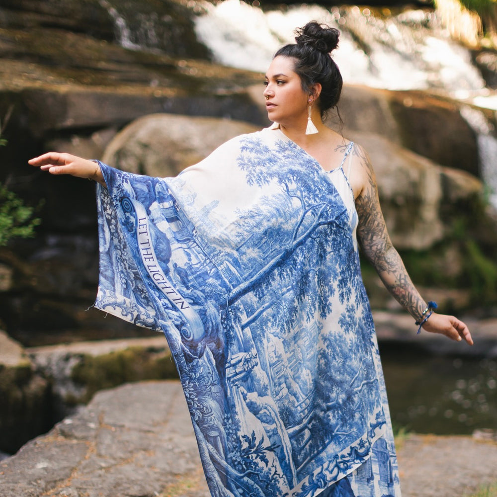 Let the Light In airy bamboo viscose scarf featuring print of Delft blue and white pottery, and positive message of light and hope - Market of Stars