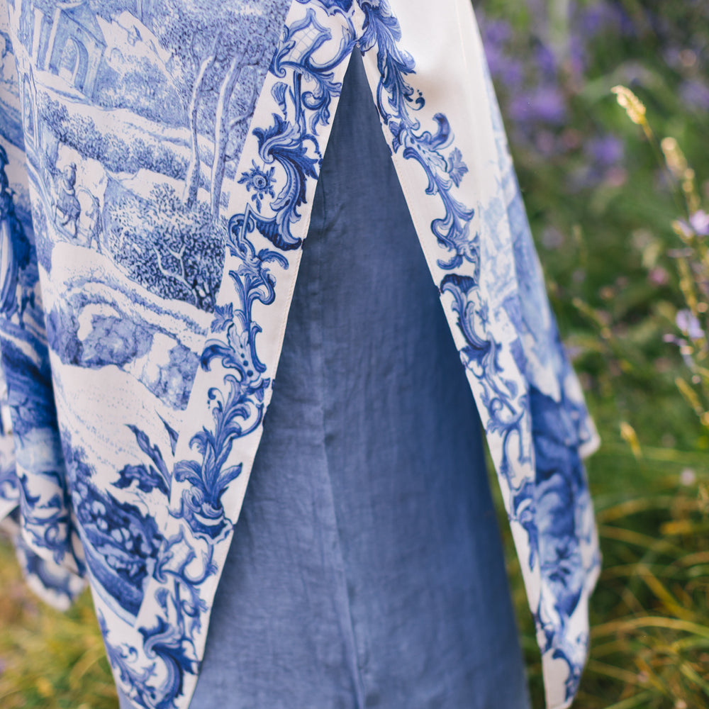 
                  
                    Model wearing Let the Light In Goddess kimono duster featuring print of Delft blue and white landscape pottery, and positive message of light and hope - Market of Stars
                  
                