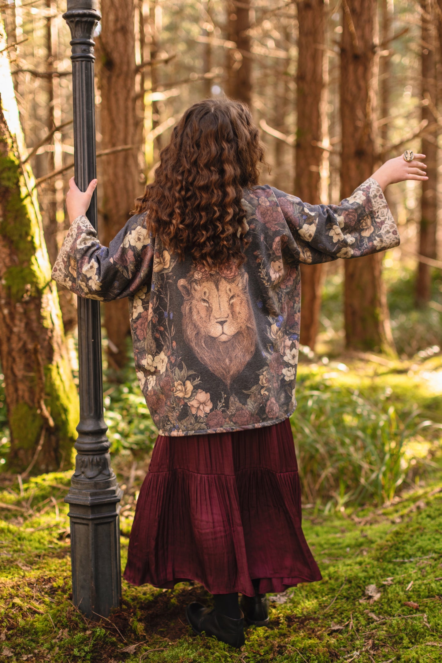 Model wearing the Lionheart Cottage Cardigan ft artwork by illustrator Jessica Roux - Market of Stars