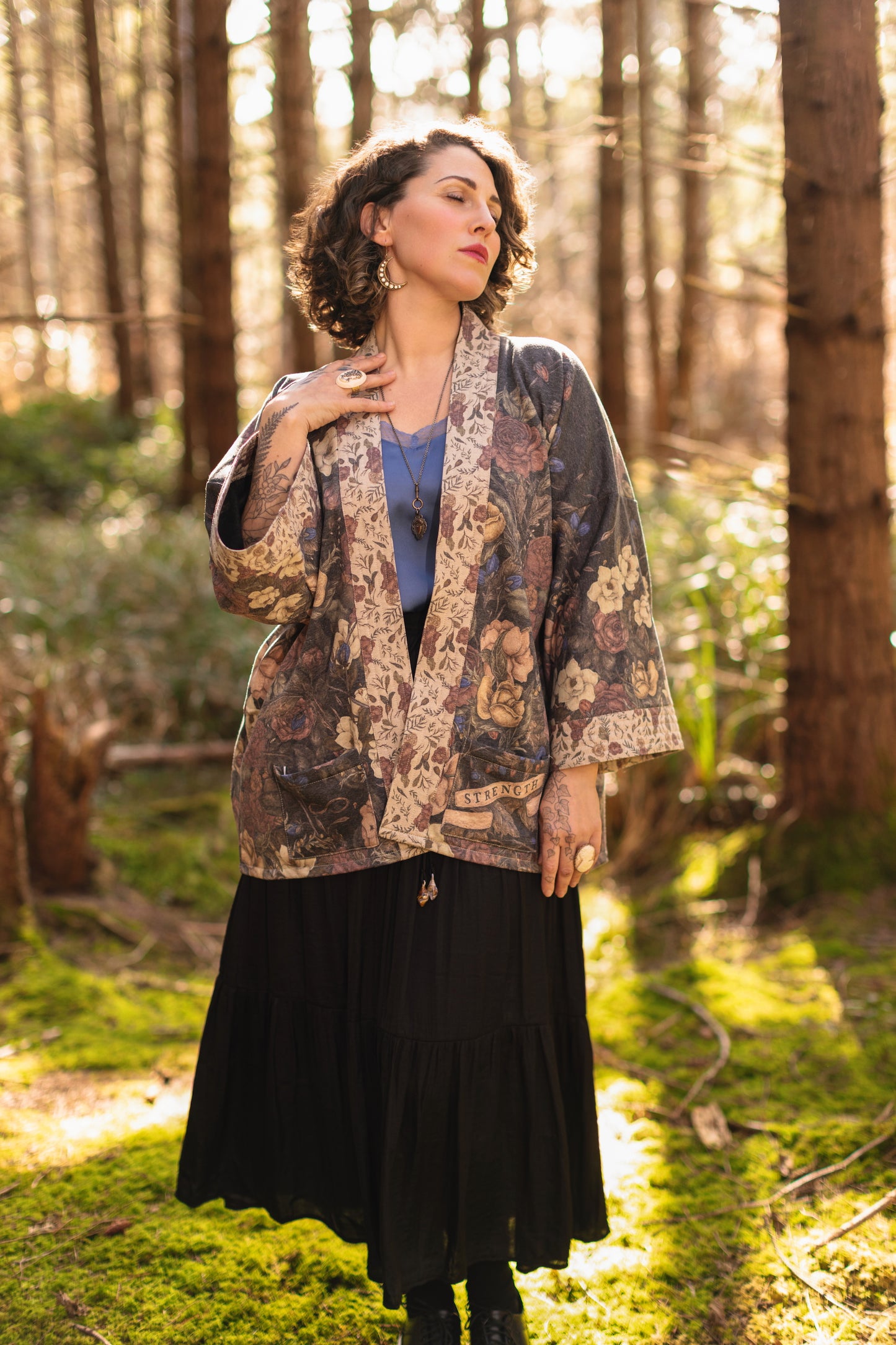 Model wearing the Lionheart Cottage Cardigan ft artwork by illustrator Jessica Roux - Market of Stars