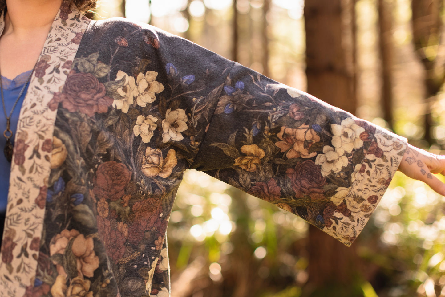 Model wearing the Lionheart Cottage Cardigan ft artwork by illustrator Jessica Roux - Market of Stars