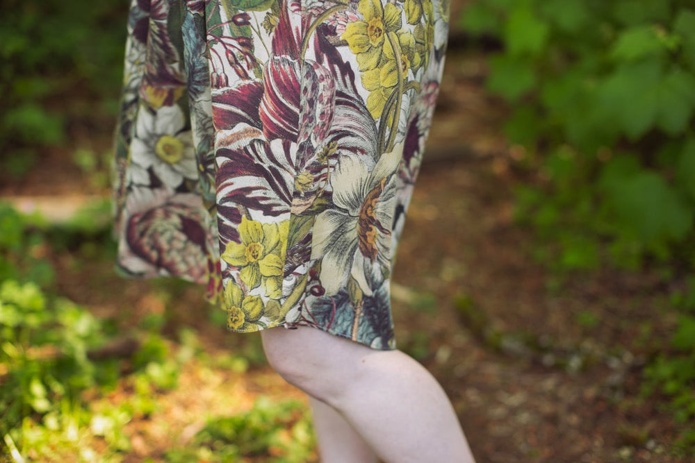 
                  
                    Model styled in Love Grows Wild Artist Dress featuring hand-coloured 1700s floral etchings and bumblebee detail – inspired by the French chemise – Market of Stars
                  
                