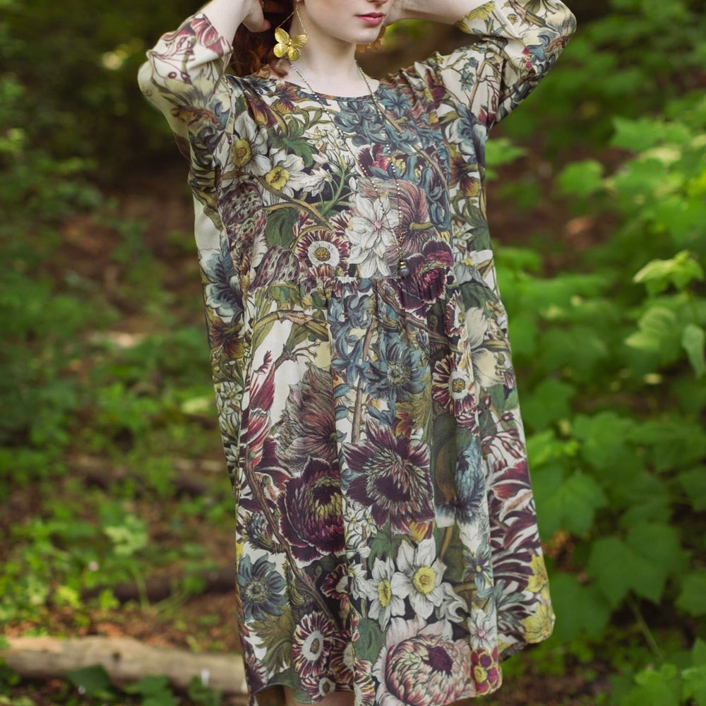 
                  
                    Model styled in Love Grows Wild Artist Dress featuring hand-coloured 1700s floral etchings and bumblebee detail – inspired by the French chemise – Market of Stars
                  
                