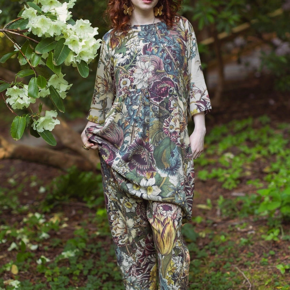 
                  
                    Model styled in Love Grows Wild Artist Dress featuring hand-coloured 1700s floral etchings and bumblebee detail – inspired by the French chemise – Market of Stars
                  
                