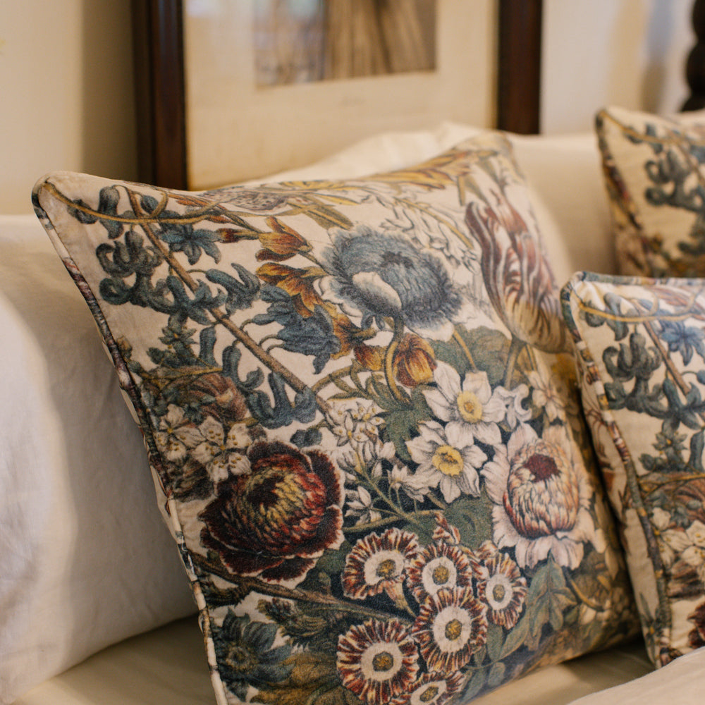 
                  
                    A soft cotton velvet cushion featuring lush 1700s botanical blooms - Market of Stars
                  
                