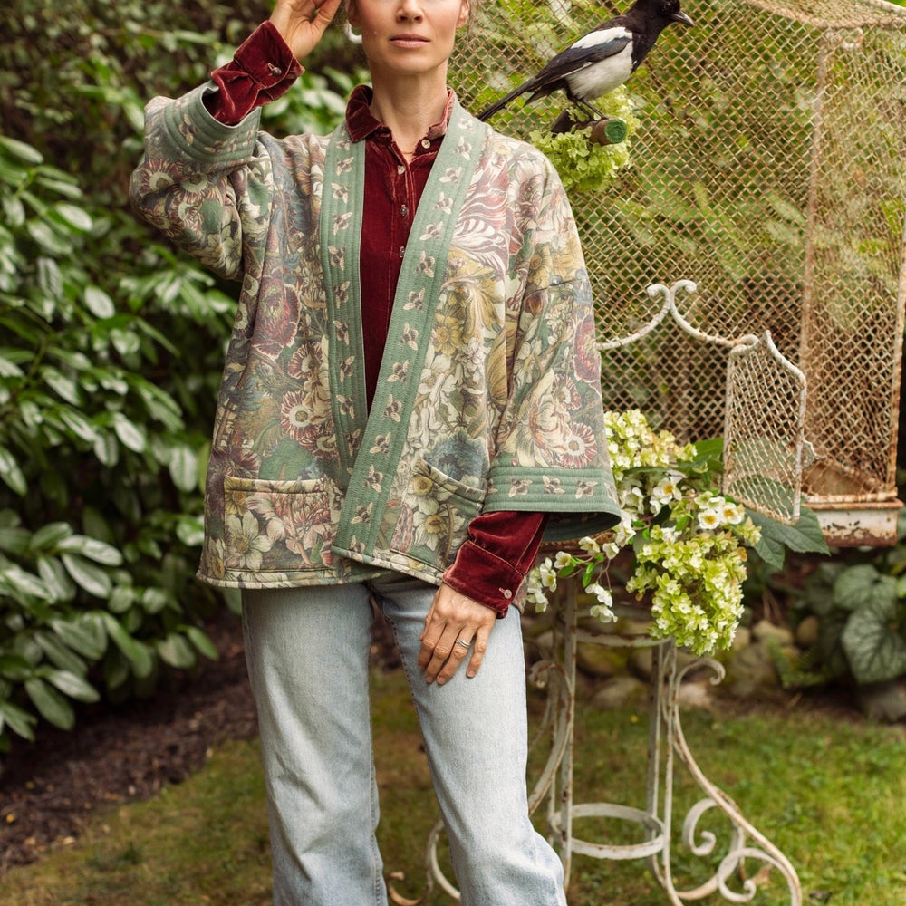 
                  
                    Love Grows Wild Cottage Cardigan featuring 1700s floral etchings and bumblebee trim – cozy fleece-lined cardigan perfect for cooler days – Market of Stars.
                  
                