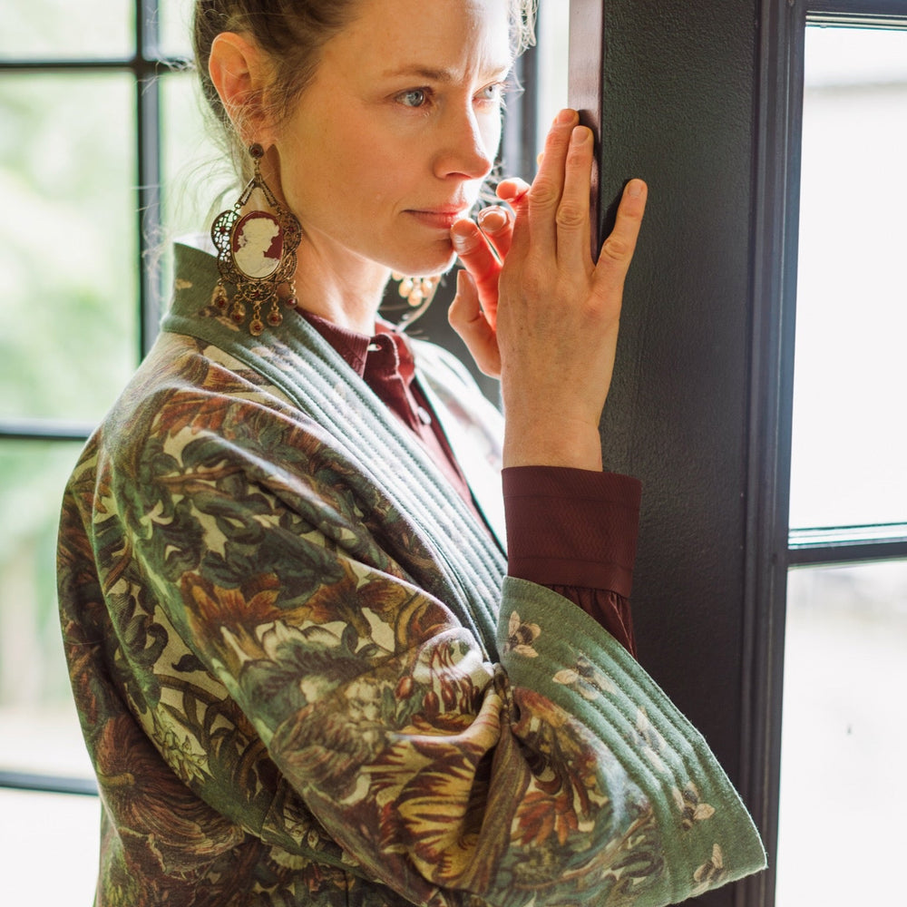 
                  
                    Love Grows Wild Cottage Cardigan featuring 1700s floral etchings and bumblebee trim – cozy fleece-lined cardigan perfect for cooler days – Market of Stars.
                  
                