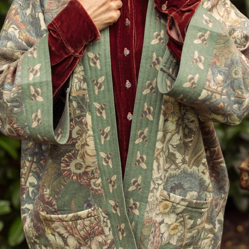 
                  
                    Love Grows Wild Cottage Cardigan featuring 1700s floral etchings and bumblebee trim – cozy fleece-lined cardigan perfect for cooler days – Market of Stars.
                  
                