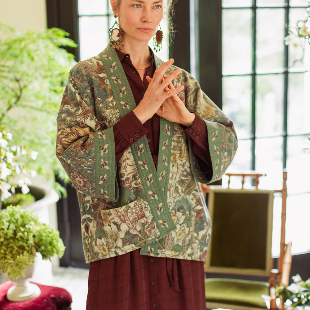 
                  
                    Love Grows Wild Cottage Cardigan featuring 1700s floral etchings and bumblebee trim – cozy fleece-lined cardigan perfect for cooler days – Market of Stars.
                  
                