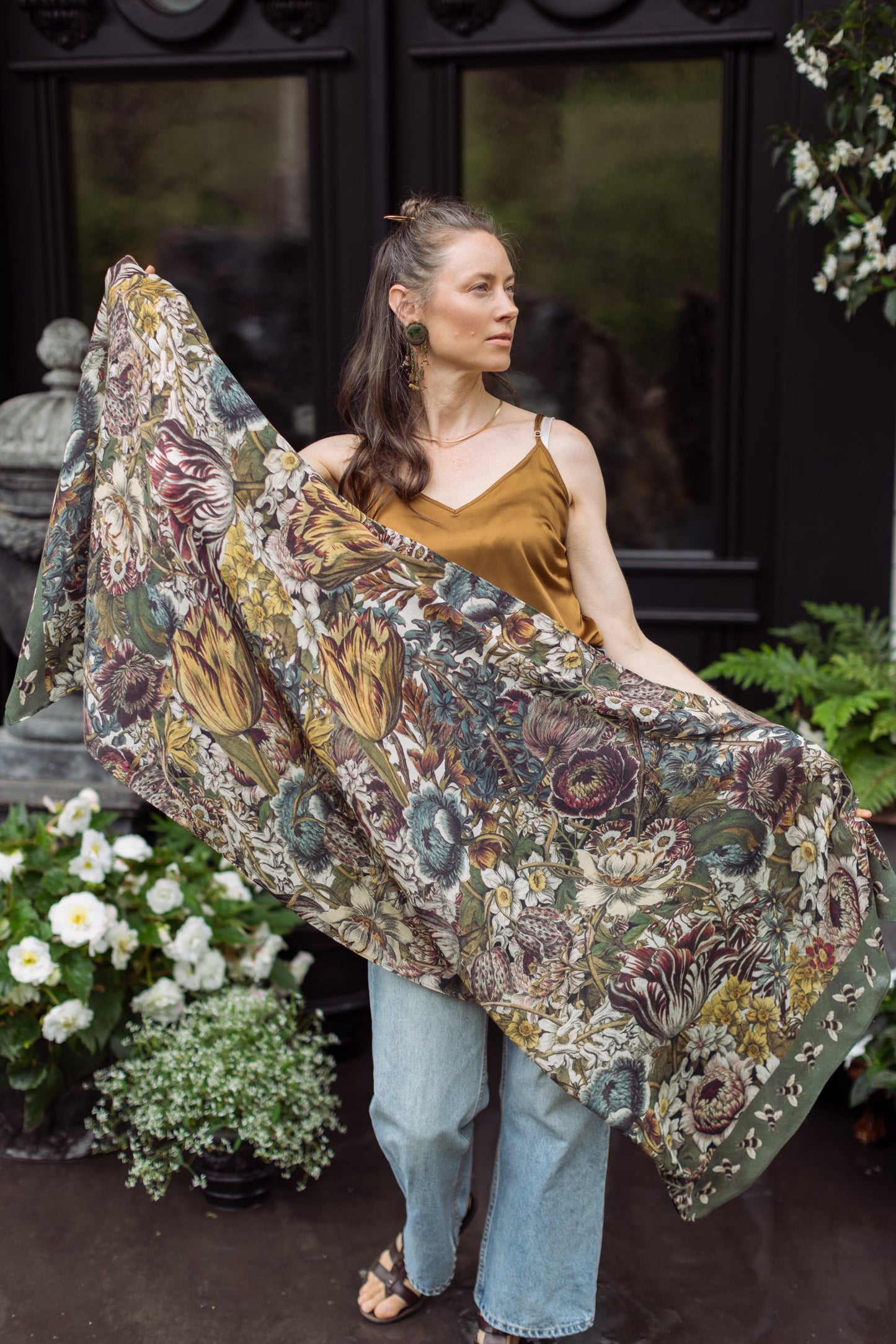 Model wearing soft viscose scarf featuring 1700s March botanical etchings and bumblebee trim from vintage seed catalogue – Market of Stars.