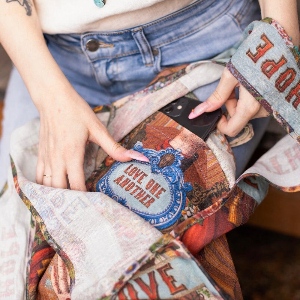 
                  
                    Tote bag featuring joyful 1854 floral artwork, heart-in-hand symbol, and vintage love notes, designed for everyday adventures – Market of Stars
                  
                