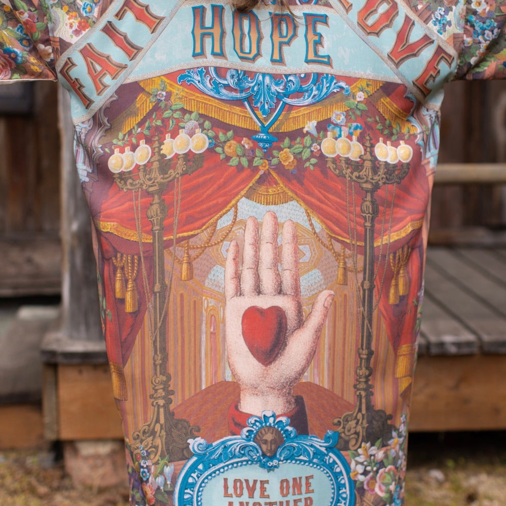 
                  
                    Model wearing romantic full-length kimono featuring joyful 1854 floral art, heart-in-hand symbol, and handwritten messages of love – Market of Stars
                  
                