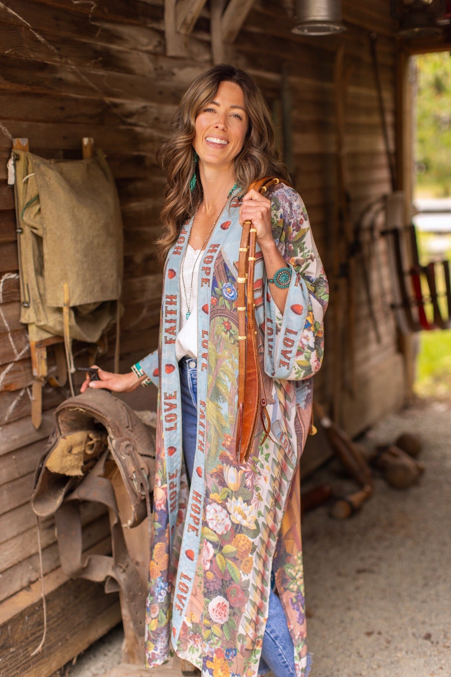 Model wearing romantic full-length kimono featuring joyful 1854 floral art, heart-in-hand symbol, and handwritten messages of love – Market of Stars