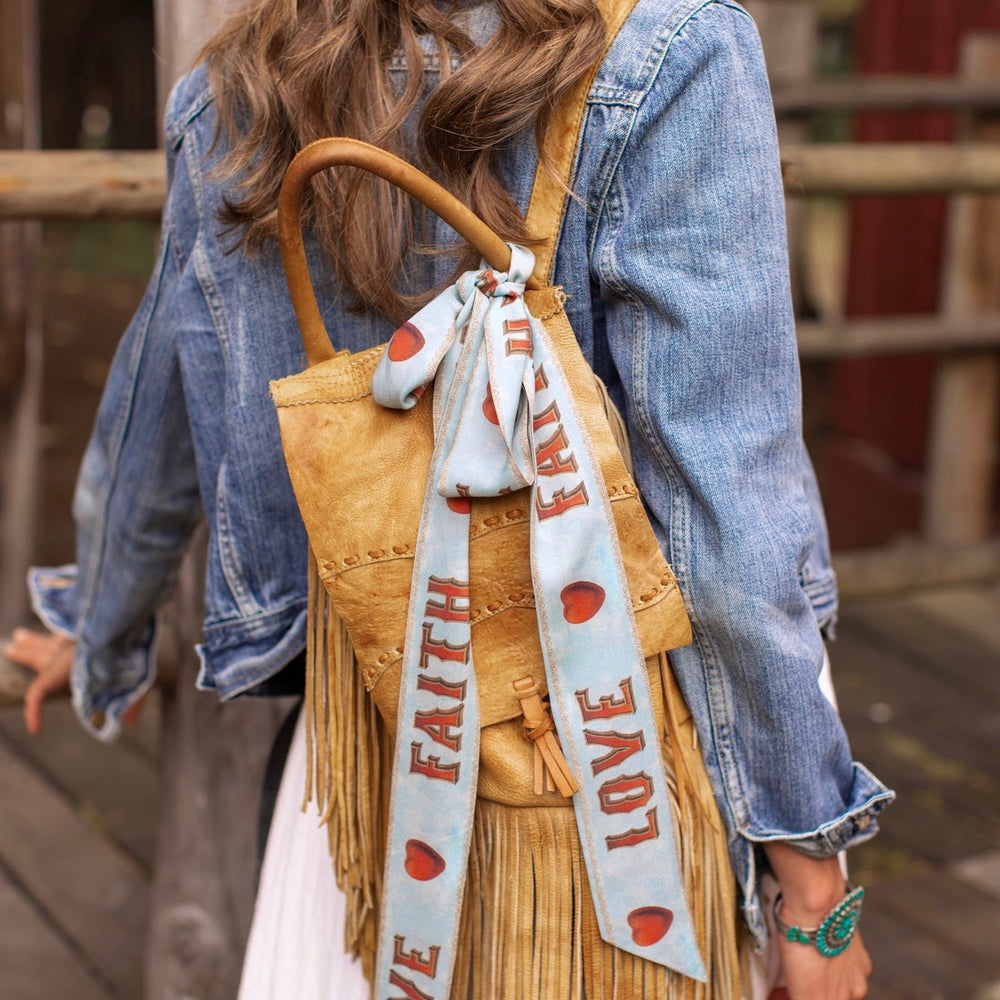
                  
                    Model wearing romantic full-length kimono featuring joyful 1854 floral art, heart-in-hand symbol, and handwritten messages of love – Market of Stars
                  
                