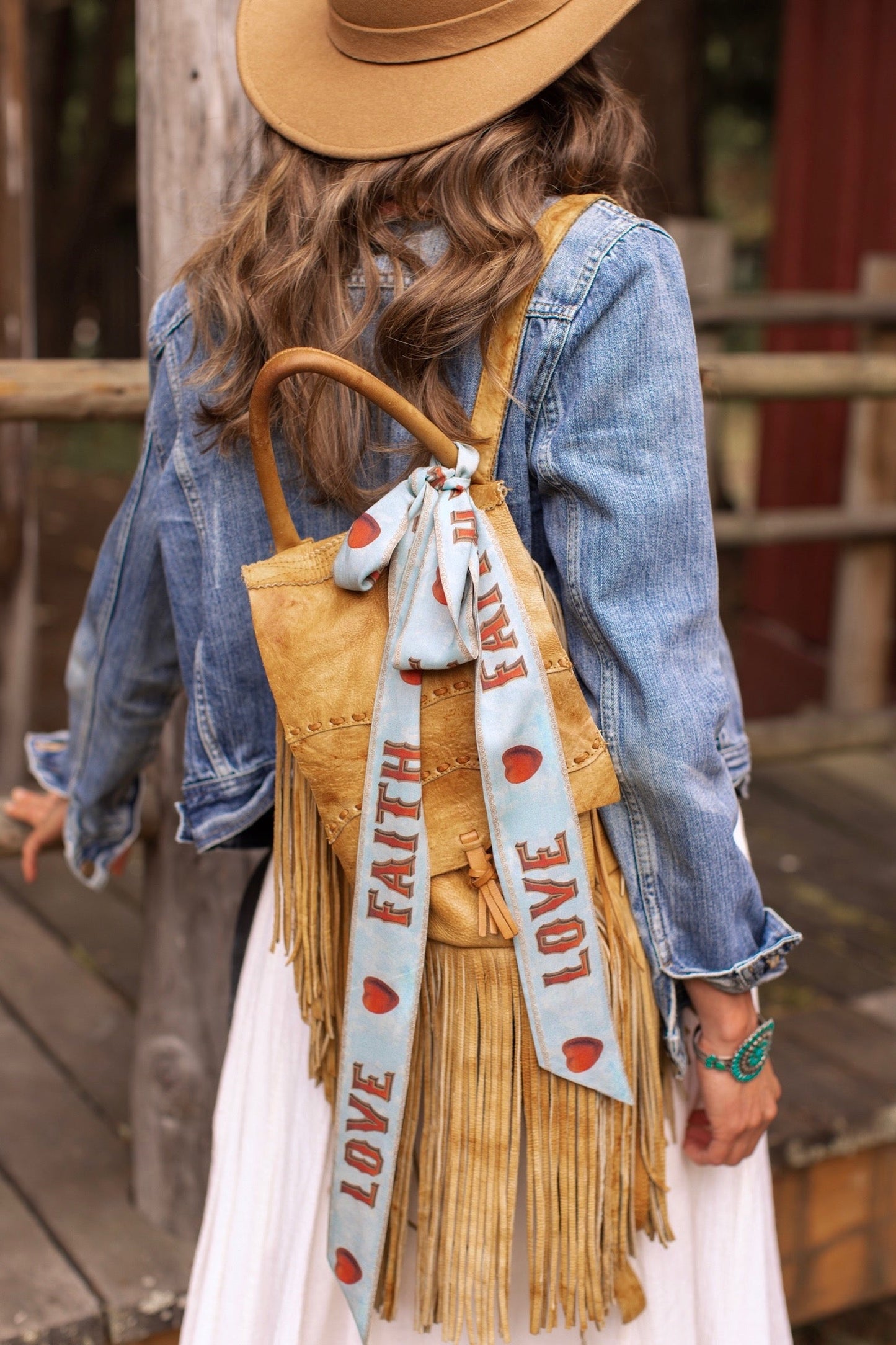 Model wearing romantic full-length kimono featuring joyful 1854 floral art, heart-in-hand symbol, and handwritten messages of love – Market of Stars