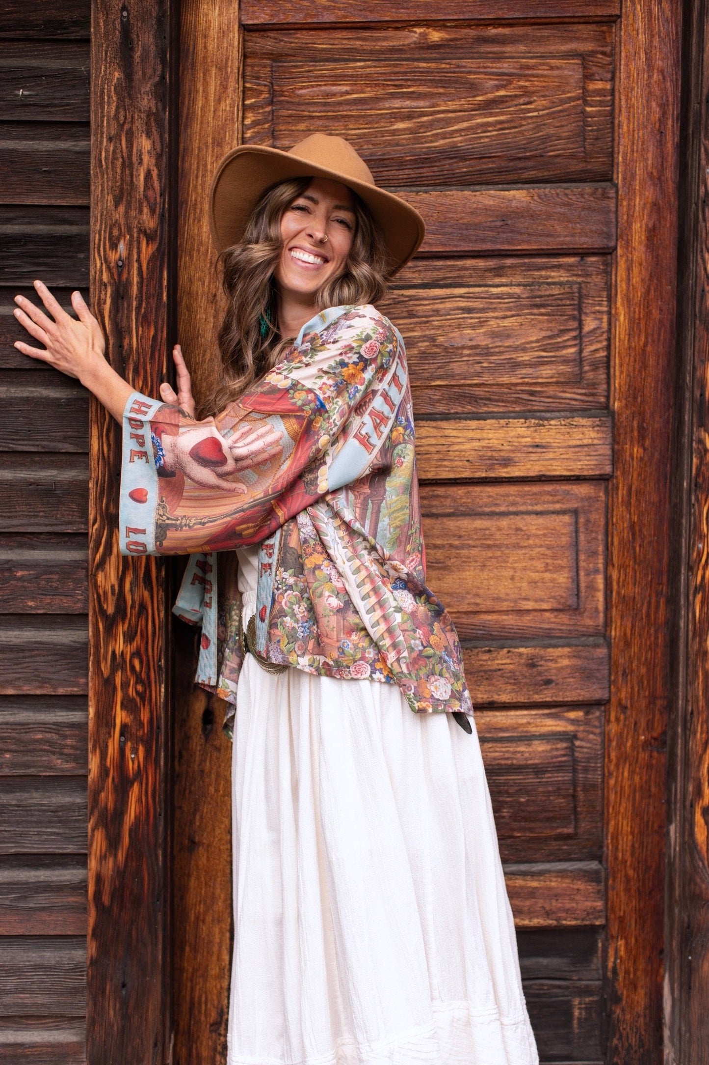 Model in cropped kimono featuring joyful 1854 floral art, heart-in-hand symbol, and handwritten love notes – Market of Stars.