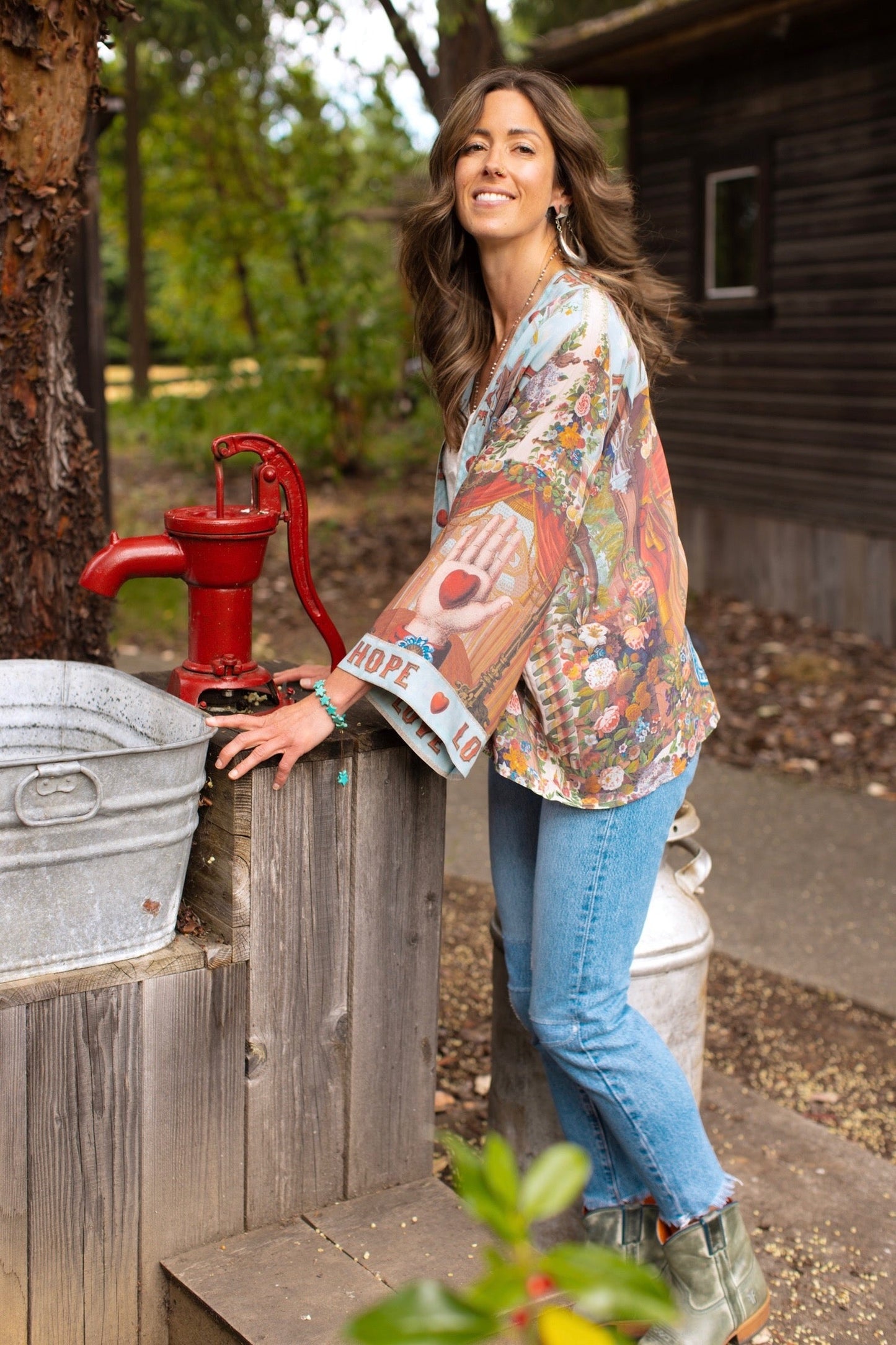 Model in cropped kimono featuring joyful 1854 floral art, heart-in-hand symbol, and handwritten love notes – Market of Stars.