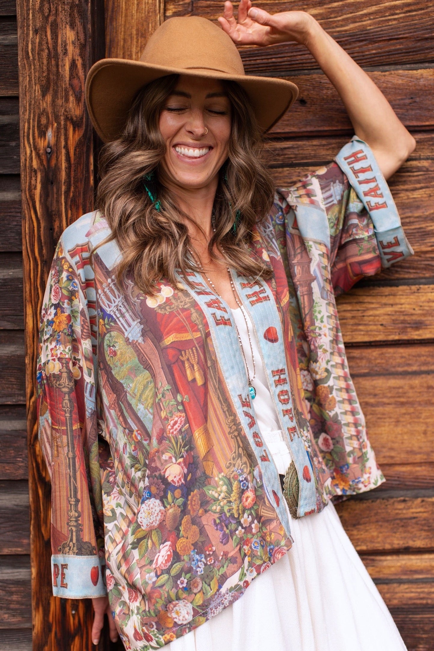 Model in cropped kimono featuring joyful 1854 floral art, heart-in-hand symbol, and handwritten love notes – Market of Stars.