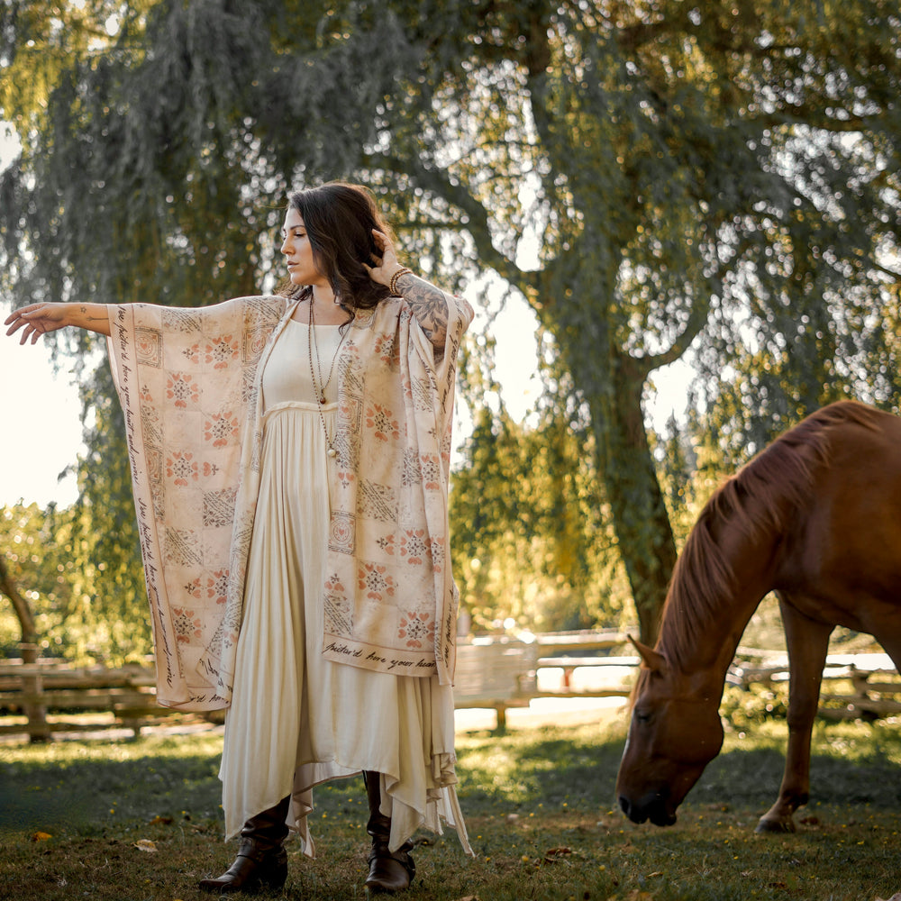 
                  
                    Model wearing romantic kimono with patchwork pattern made from a 200-year-old puzzle purse love letter featuring handwritten poetry and vintage florals – Market of Stars
                  
                